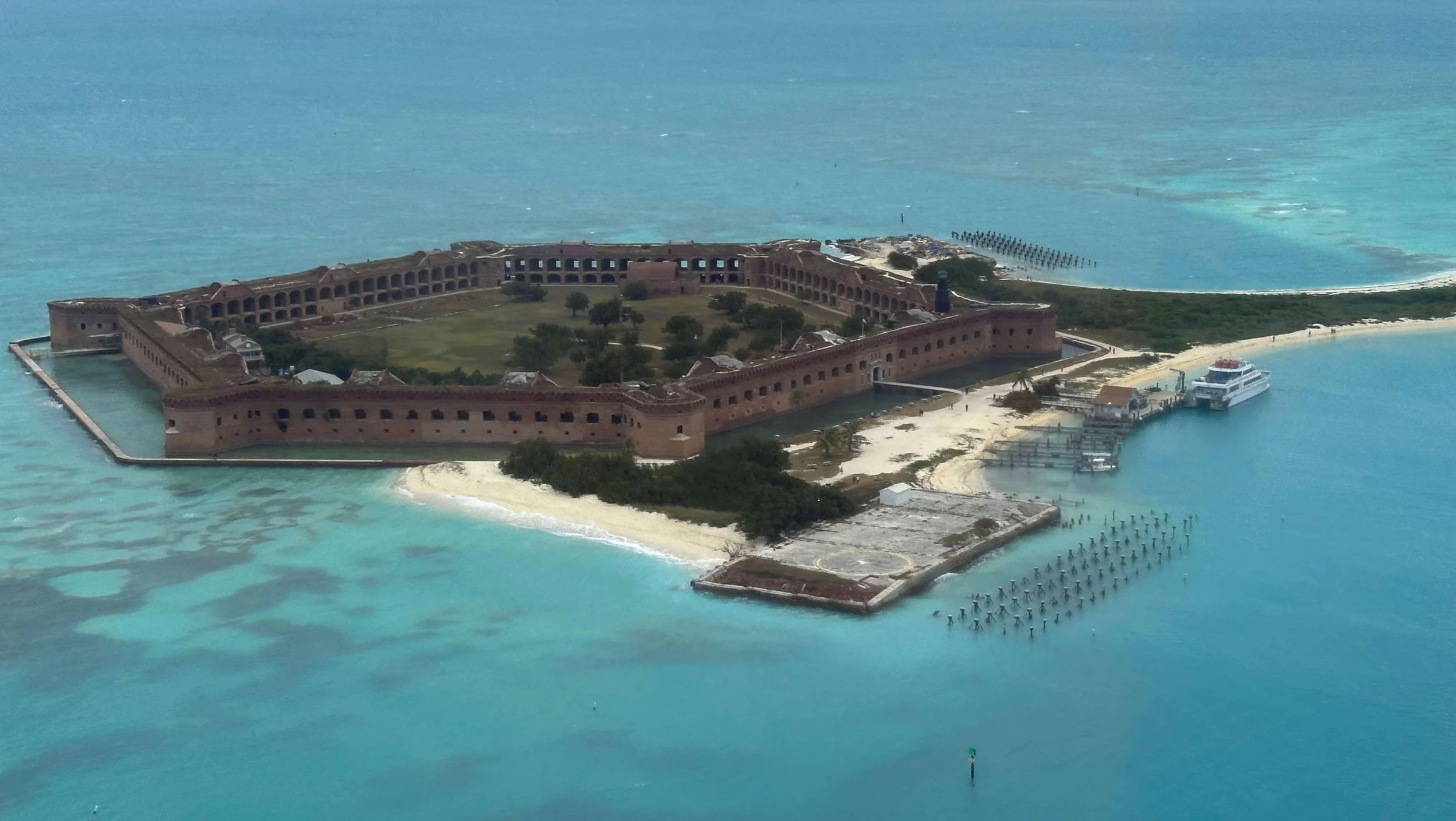 30 - Approaching Ft. Jefferson, located on Garden Key, within the national park. The Fort, a former U.S. military coastal fortress, is the largest brick masonry structure in the Americas covering 16 acres.  It's also the 3rd largest US fort.
