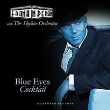 Album cover for 'Blue Eyes Cocktail' by Bank in Deed with The Skyline Orchestra, featuring a man with blue-tinted face and dark hat, dressed in a dark suit, sitting with a serious expression.