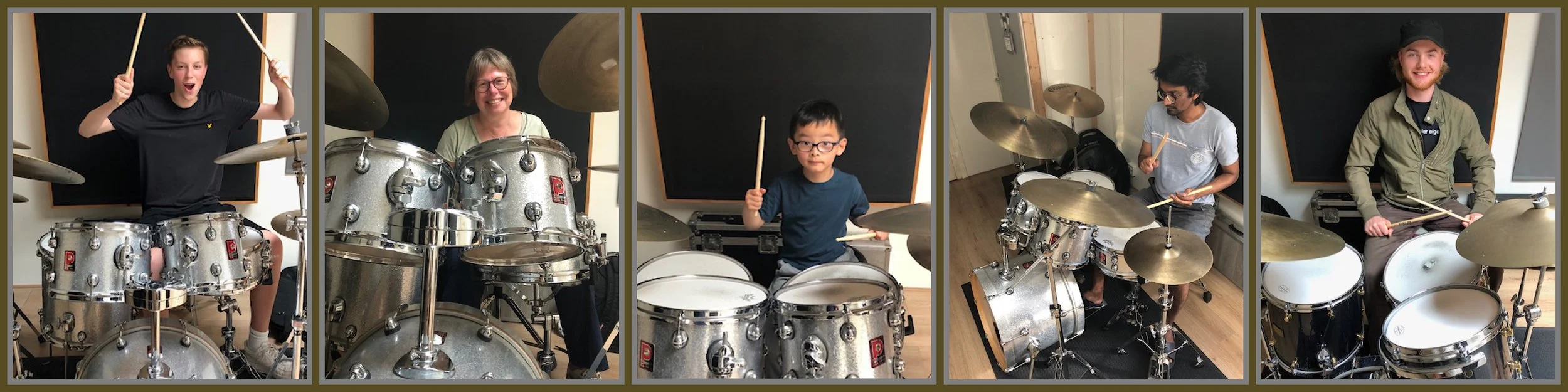 Five people in a music studio sitting behind drum kits, holding drumsticks, and smiling at the camera.