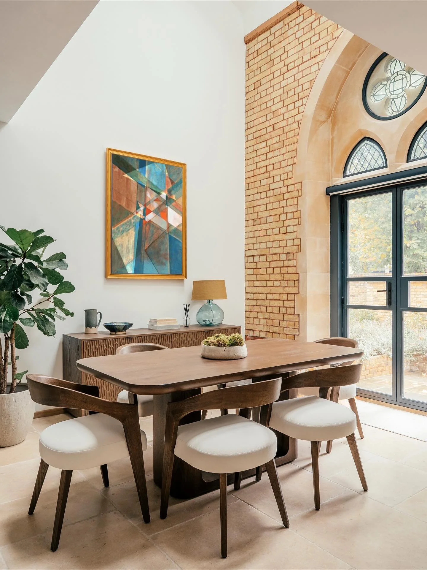 Our Teddington Project - A thoughtful blend of heritage and modern living.

This converted church retains its striking architectural features &mdash; soaring ceilings, arched windows, and exposed brick &mdash; offering a dramatic yet serene backdrop.