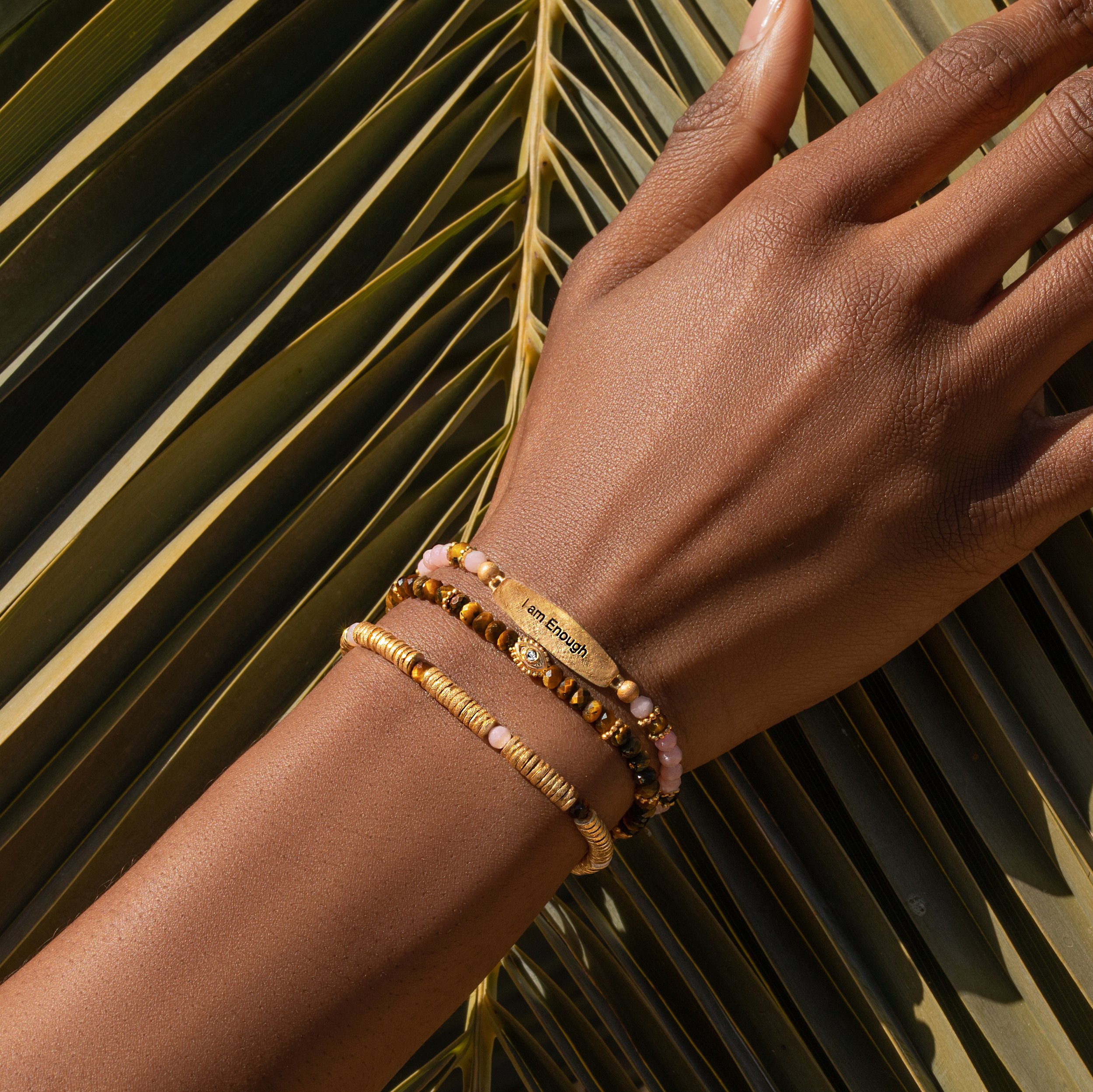 Nature photography for jewelry brand displaying bracelets with natural stones