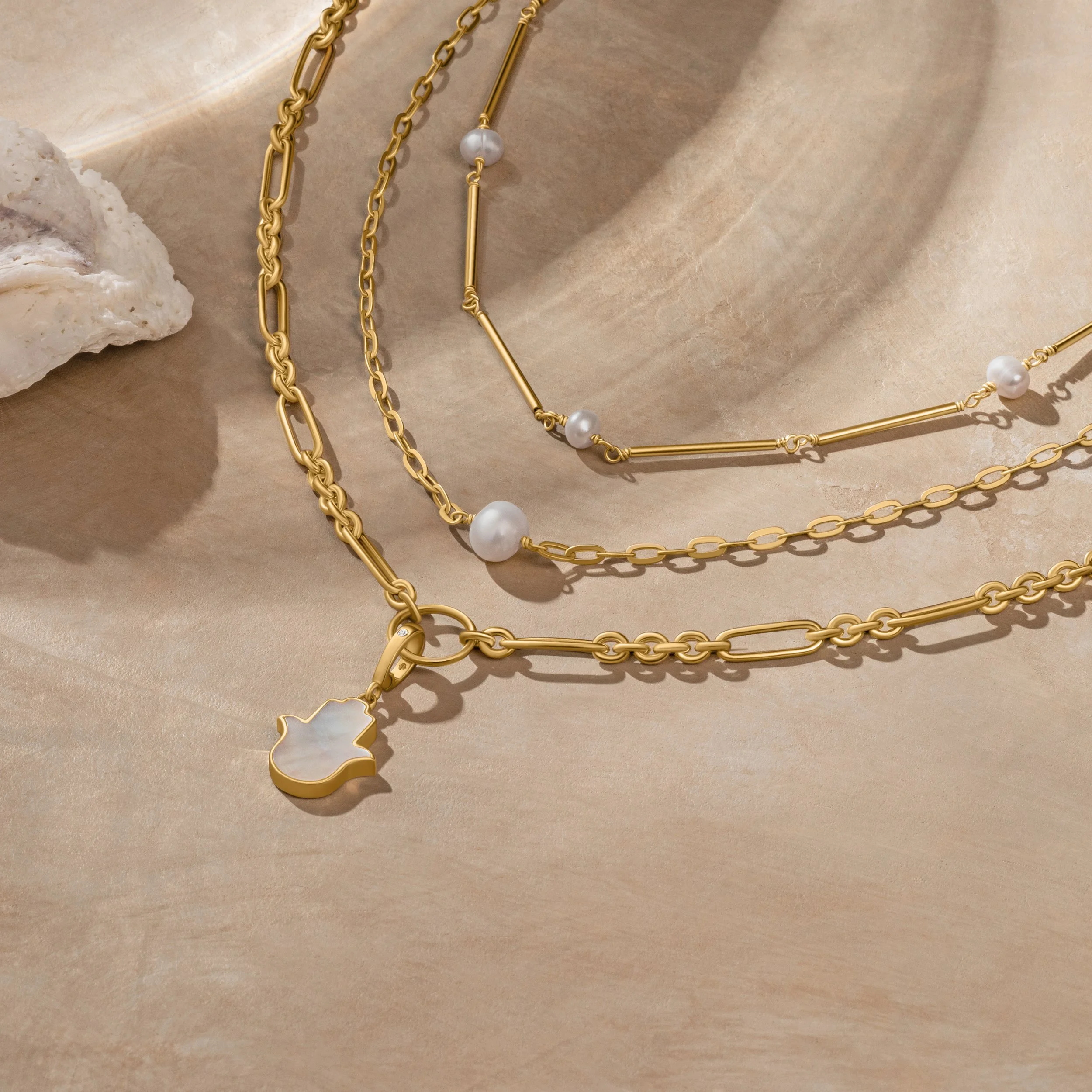 Flatlay lifestyle shot for pearl jewelry collection