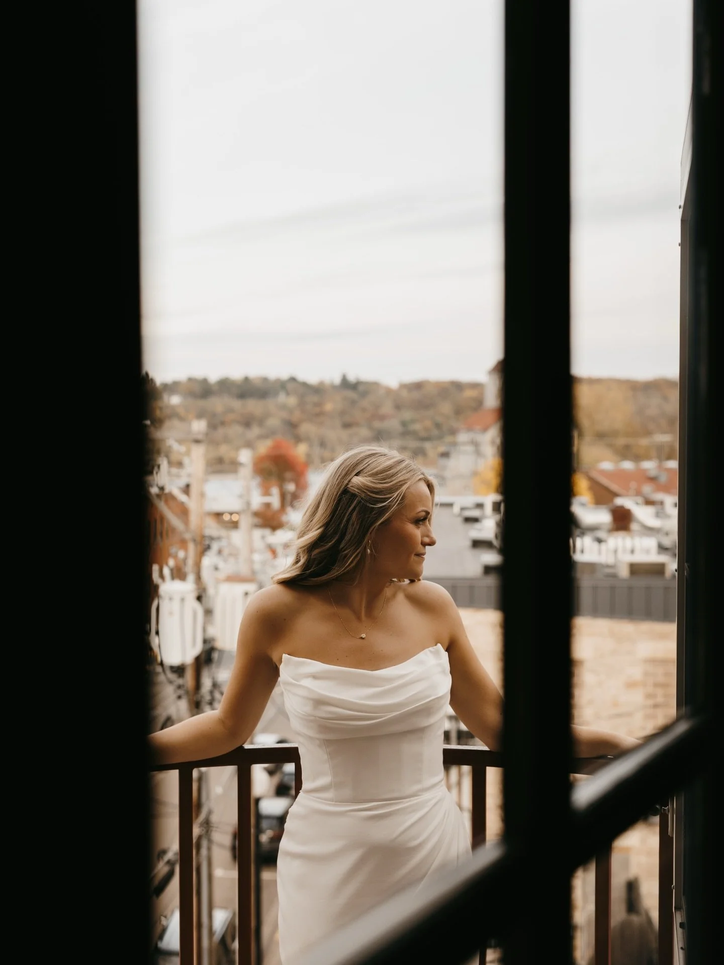 The tiny details that made these photos my favorites.

1) the unexpected beauty of this TINY adorable balcony. It was giving Paris?? Obvi the bride too. But the balcony. Swoon.

2) I actually loved that the bride was solo in this. Just a moment for h