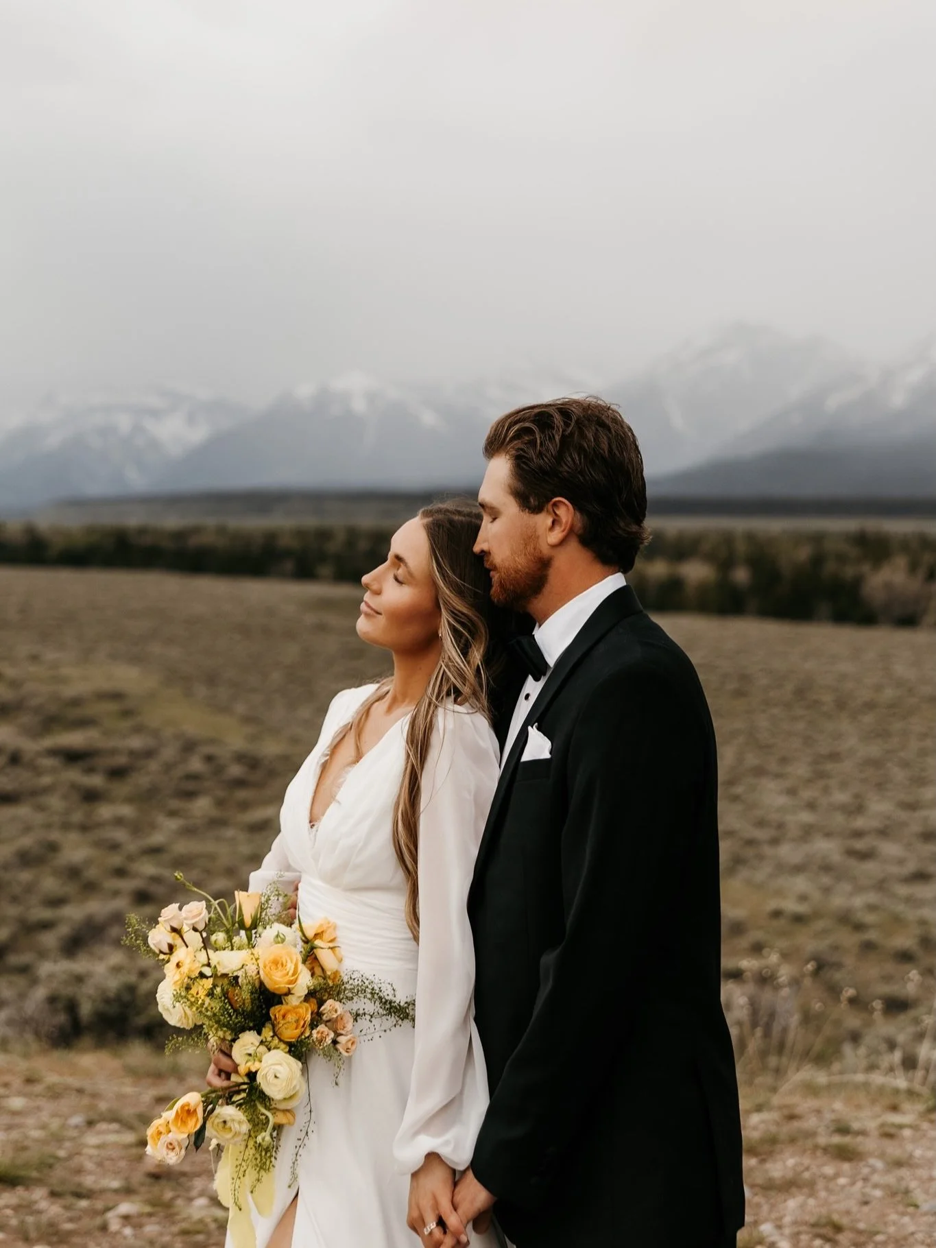 You, me, private vows, &amp; the Tetons.

Dress: @the.sheisme @sheismebridal 
Floral: @gildthelilytoo 
Hats: @toppedhats 
Boots: @dingo_1969 
Models: @paige_jenks 
@unscriptedphotographers