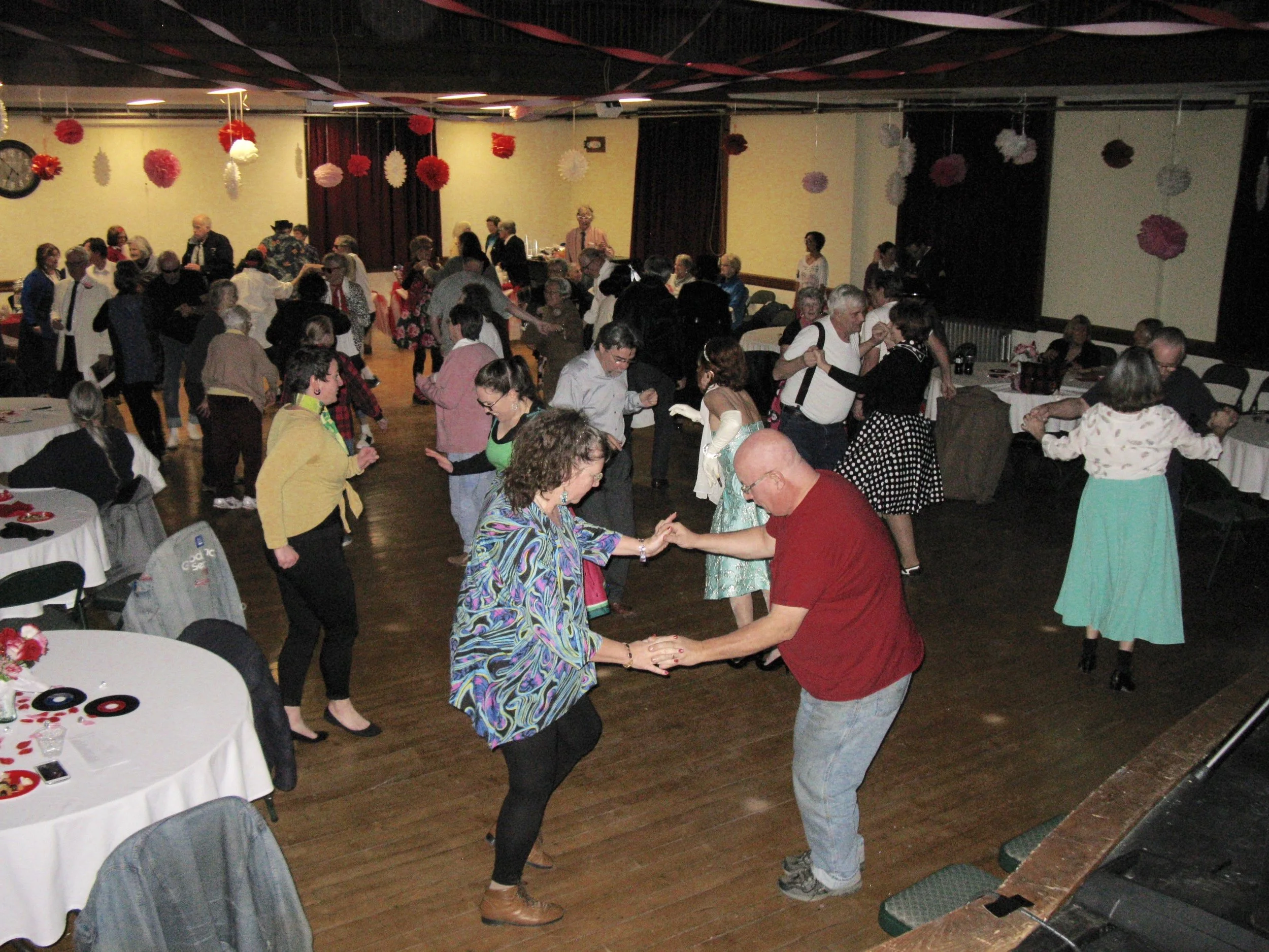 A large group of partygoers dance the night away at Watts Hall, a wedding venue in Thomaston Maine.