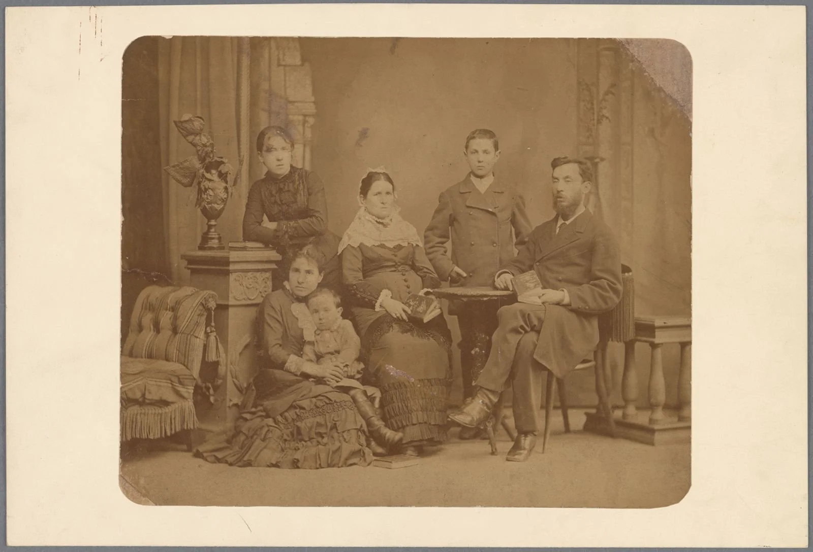 Sepia portrait of Emma Goldman and her family  in St. Petersburg, Russia, 1883