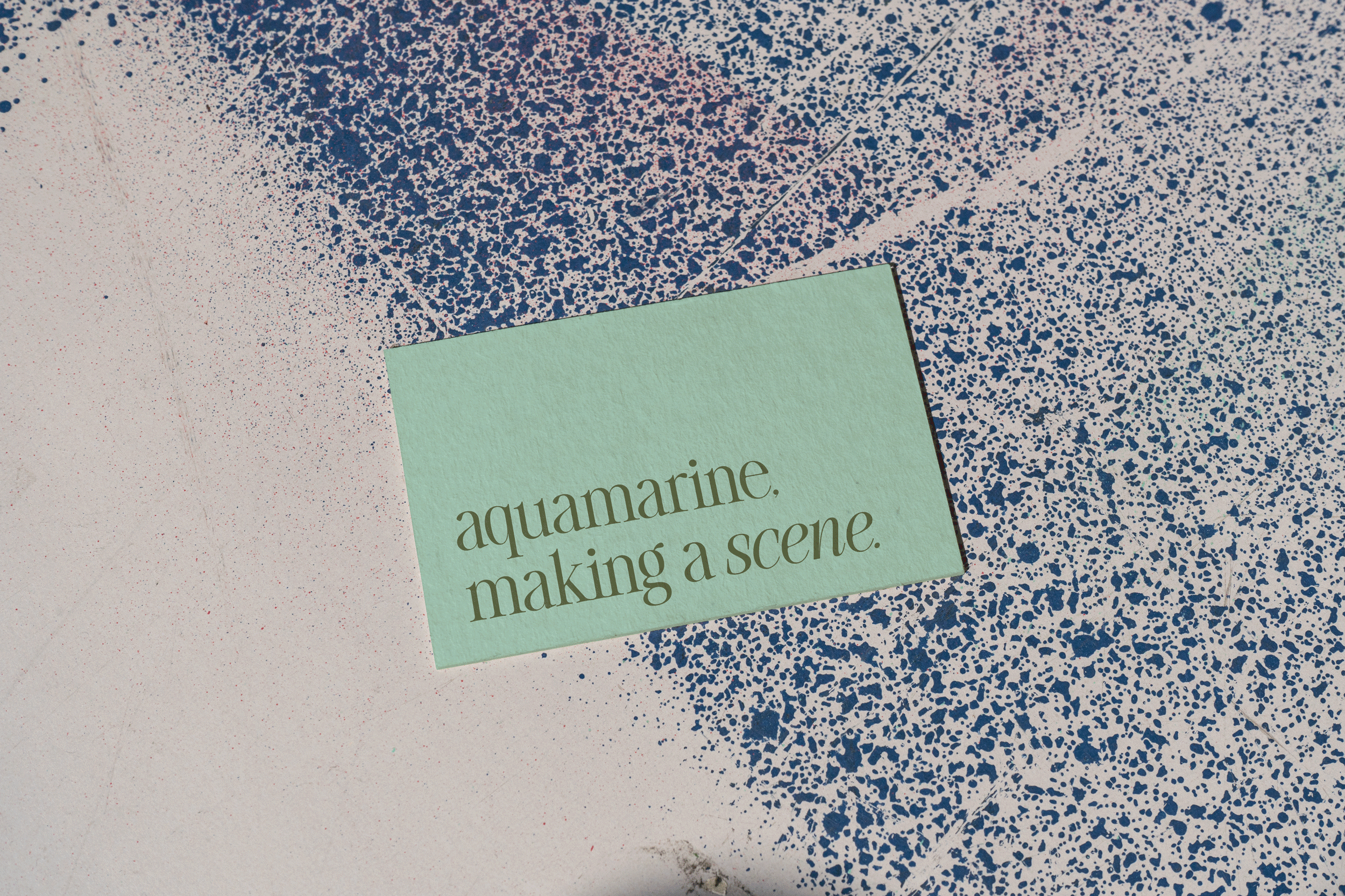 A mockup of a business card, showing creative brand language developed for a new interior design studio based in Teesside