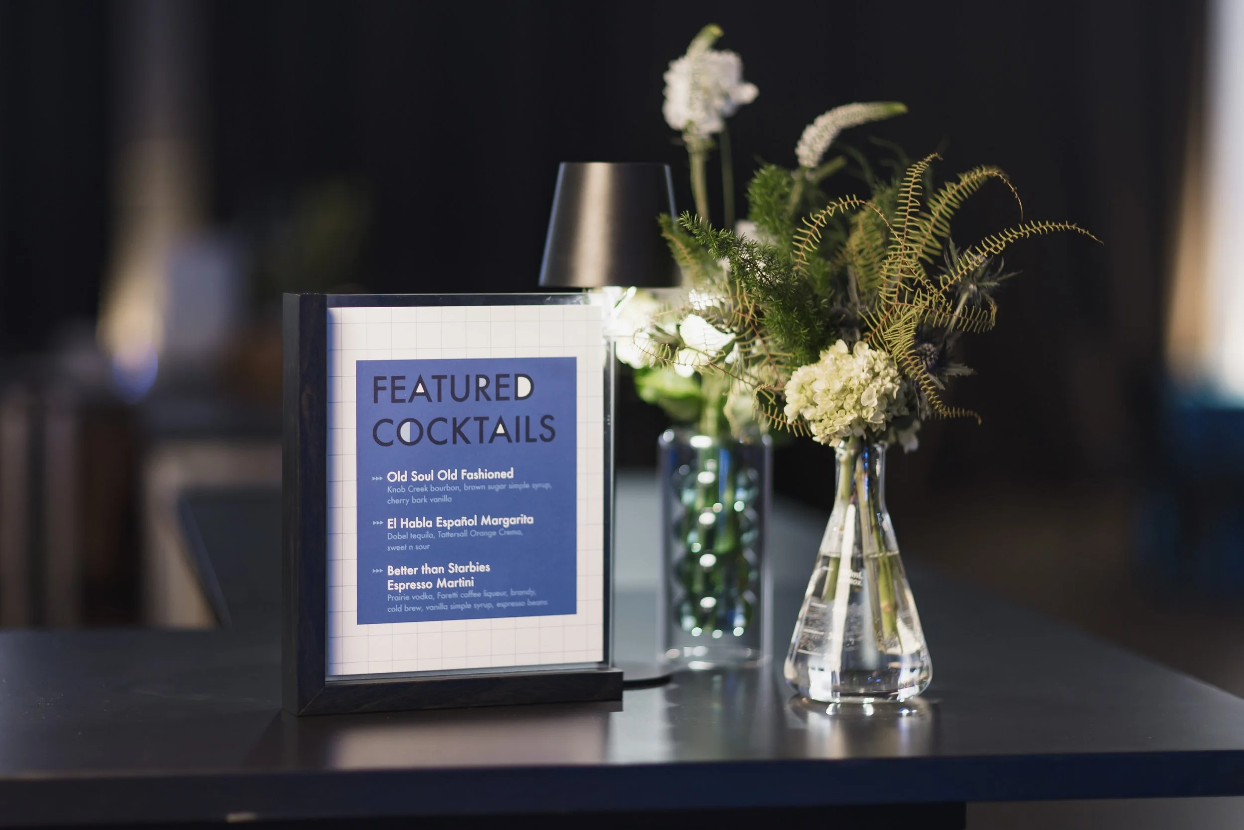 Science themed bar sign and florals for a bar mitzvah