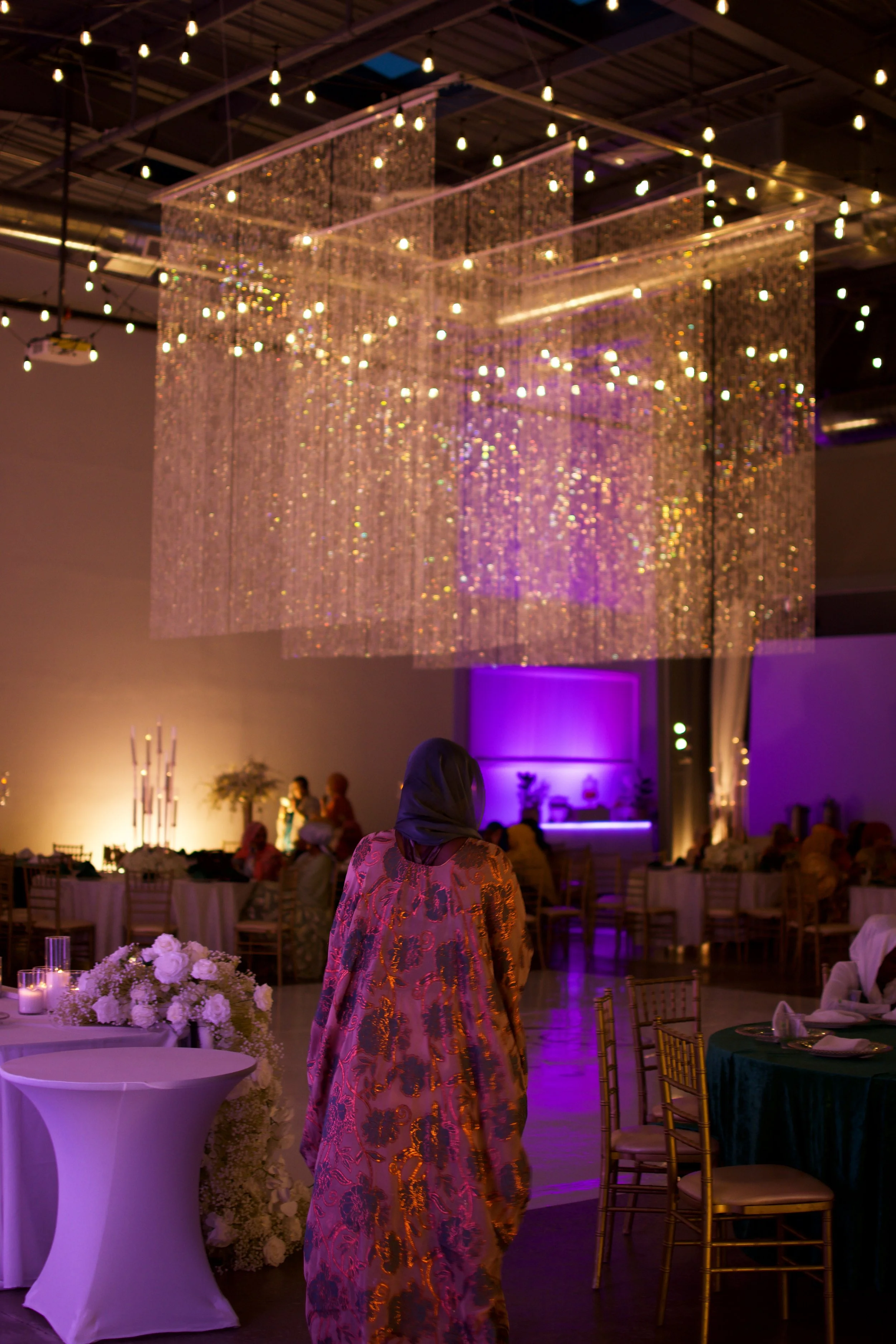Nikkah ceremony transitioned into the nighttime celebration, with specialty lighting installation. 