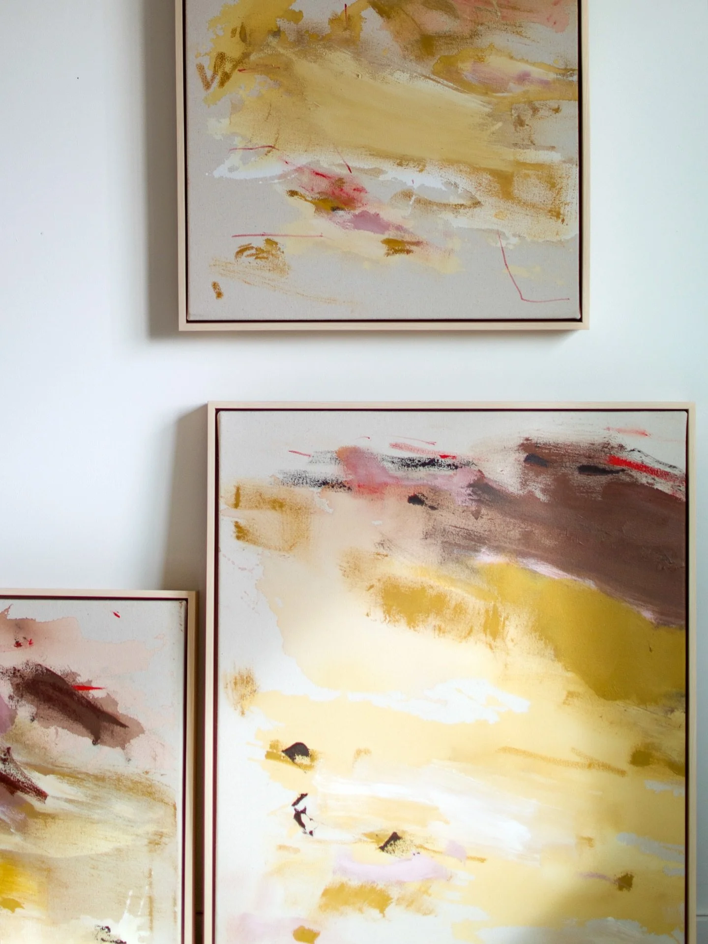 Obsessed with how these maple floater frames look! They are the perfect touch to this series.