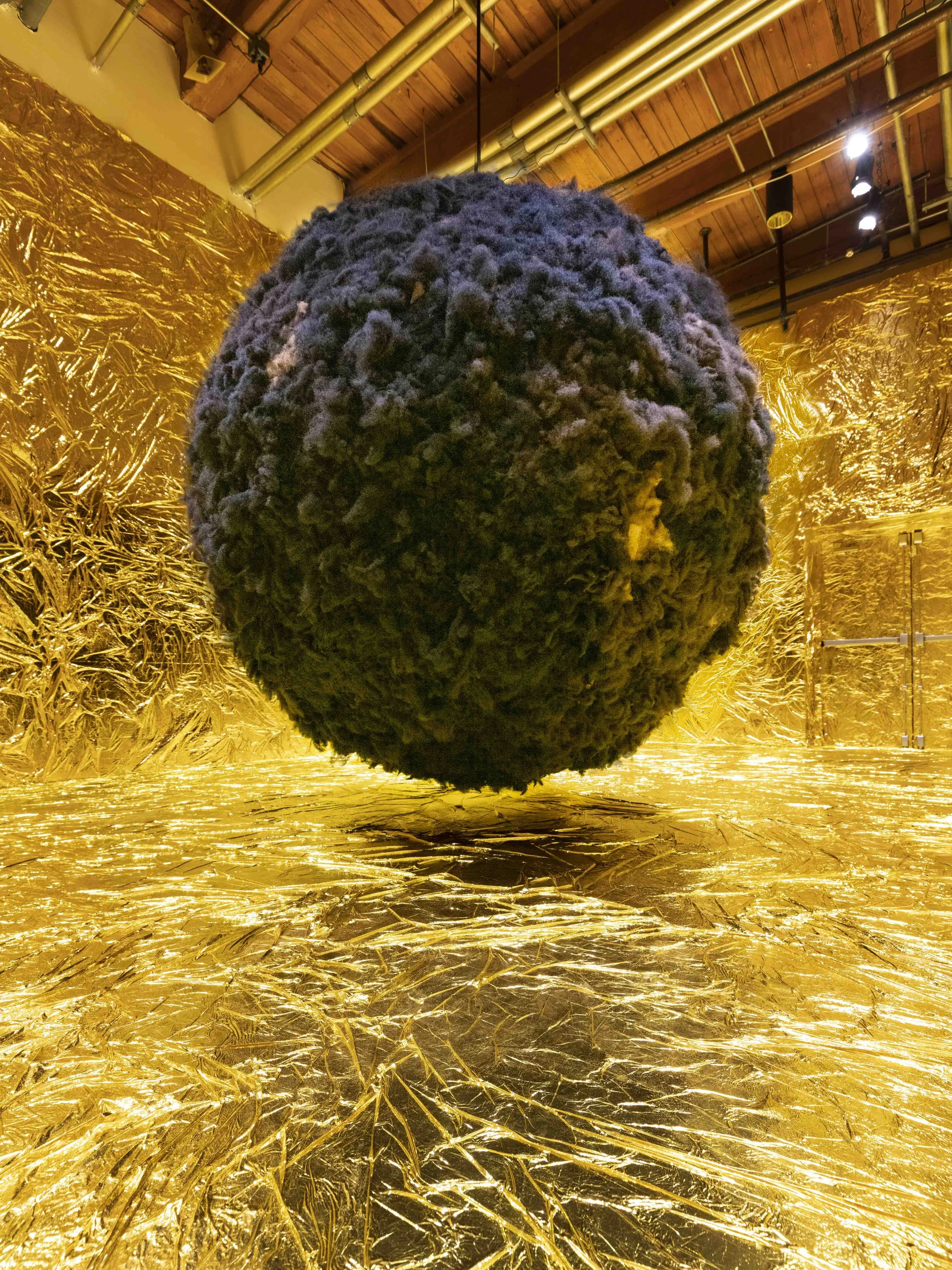 Jeannette Ehlers

We're Magic. We're Real #2, 2020/2024
Synthetic afro hair, aluminum, motor, emergency blankets, and sound
Sound by Trevor Mathison from Black Bullets