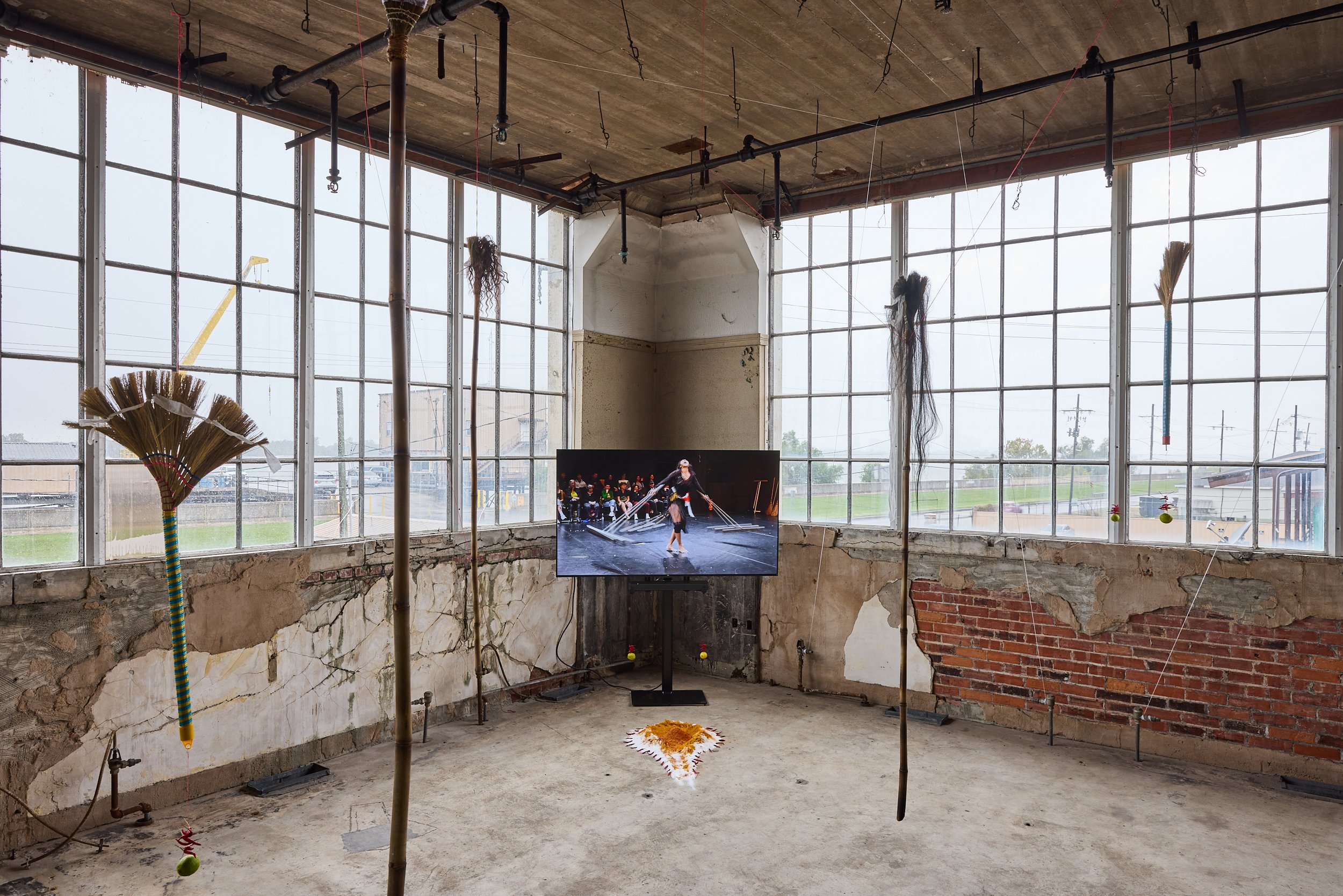 Eisa Jocson
Venuri Perera

Magic Maids, 2024
Single-channel video, color, sound, 1:20:56min.; salt, tumeric powder, chili powder, chiles, limes, brooms, and red and white strings
