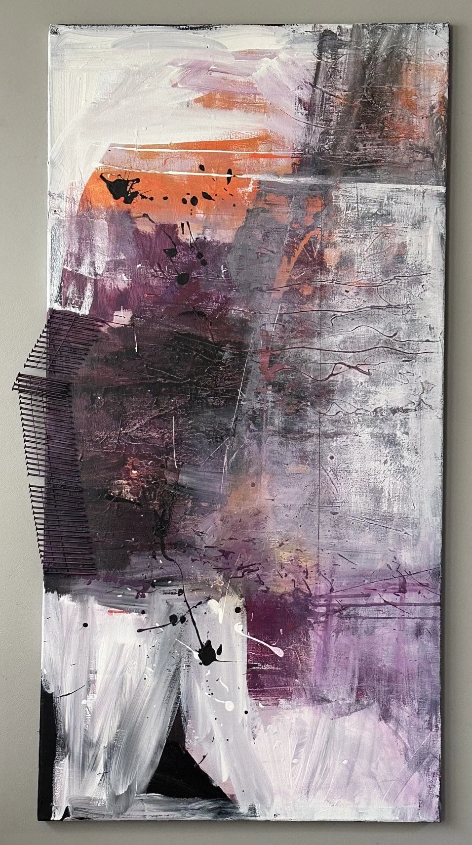 Abstract expressionist painting with white, purple, orange, black, and pink hues, featuring bold brushstrokes, splatters, and textured elements, on a vertical canvas.