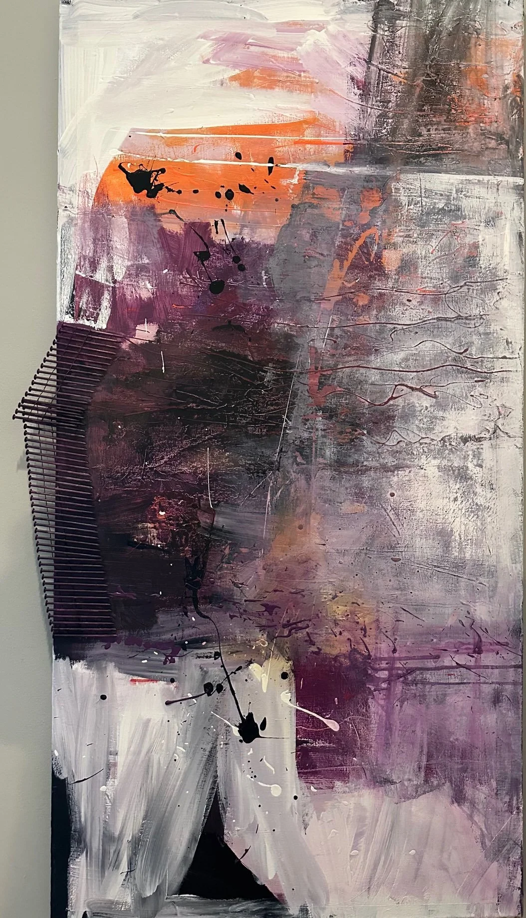 Abstract painting with shades of purple, pink, black, orange, and white, featuring splatters, brushstrokes, and textured elements.