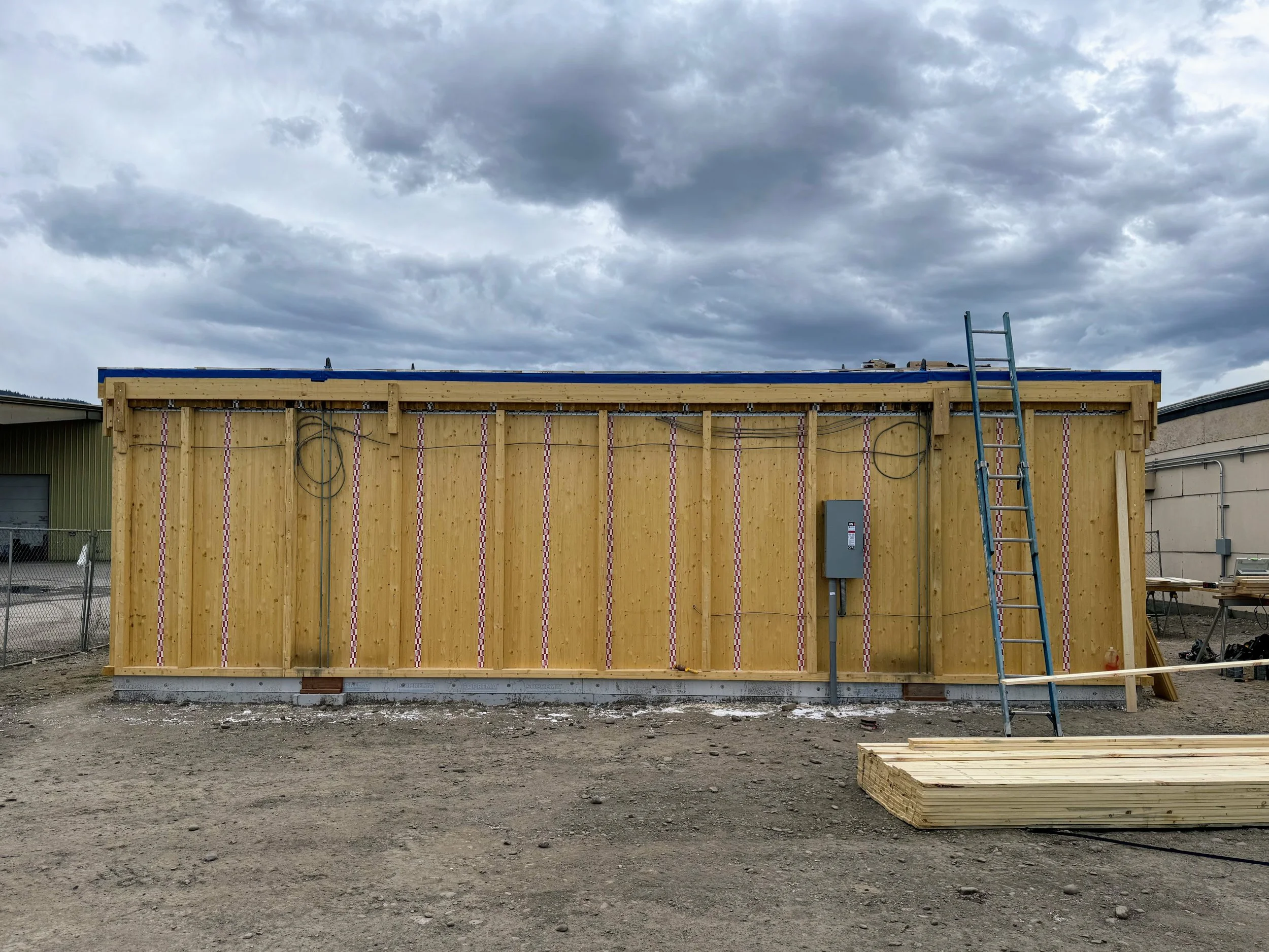 A construction photo of a mass timber bathroom building