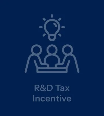 Icon of three people around a table with a light bulb above them, representing a meeting or idea, with the text 'R&D Tax Incentive' underneath.