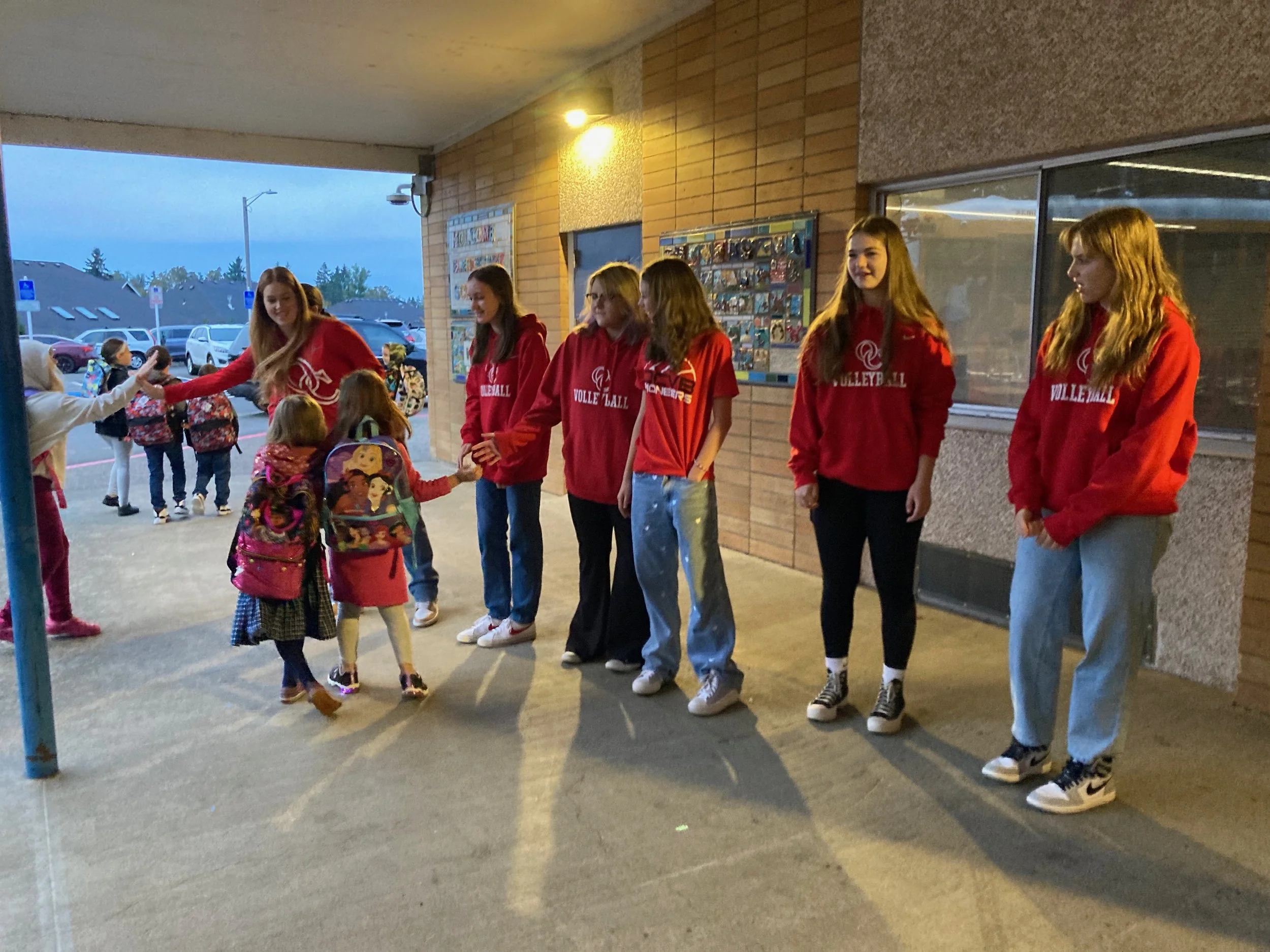 OC VB players greet students — Elementary School