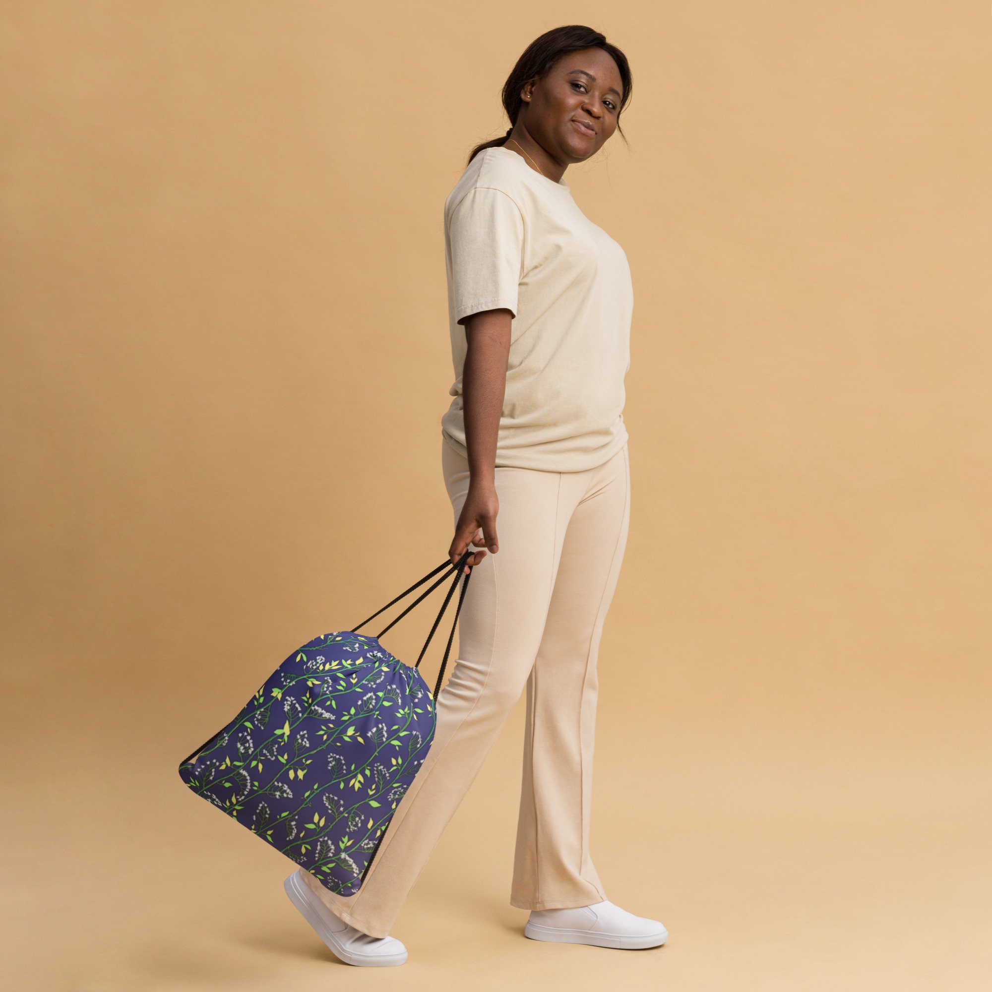 all-over-print-drawstring-bag-white-front-63e04534ceec5.jpg