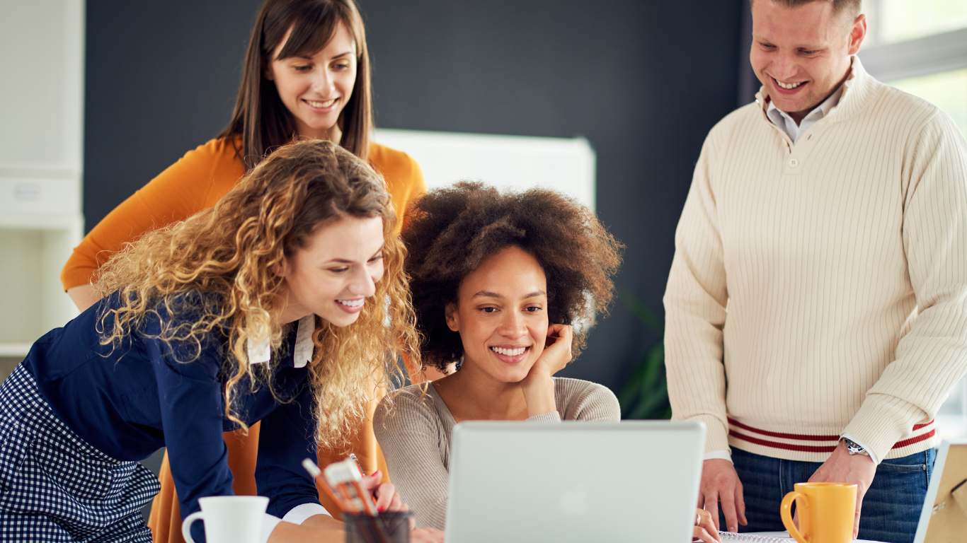 EdTech team working on a computer