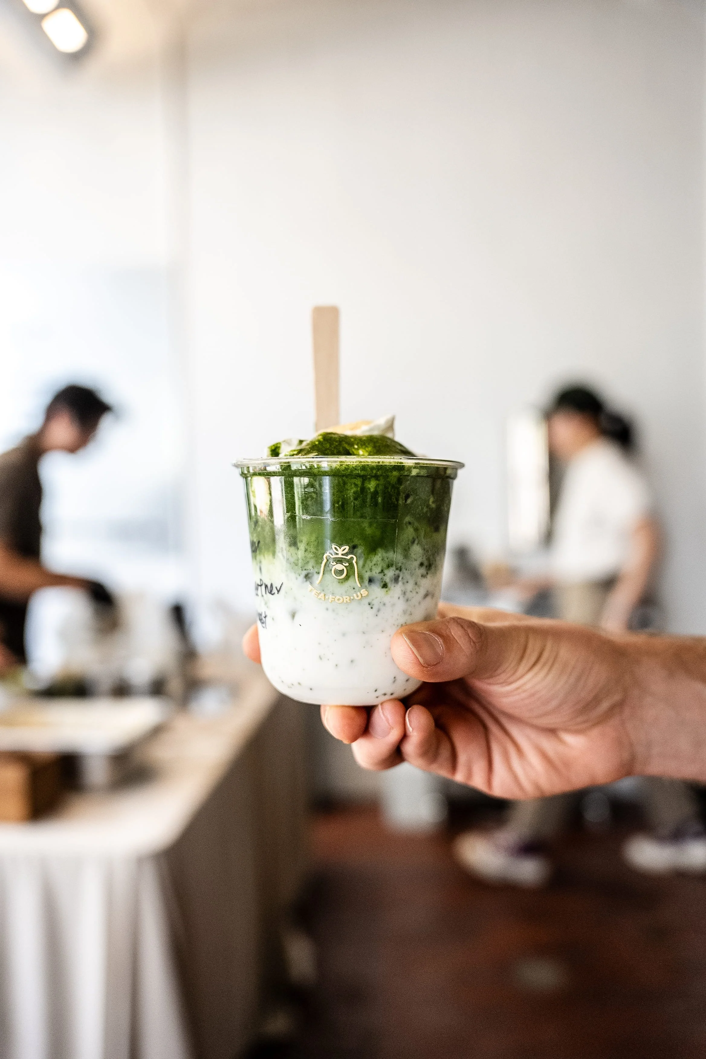 Close up shot of a matcha latte during a Tea For Us brand activation pop-up with Kindred Studio in San Francisco