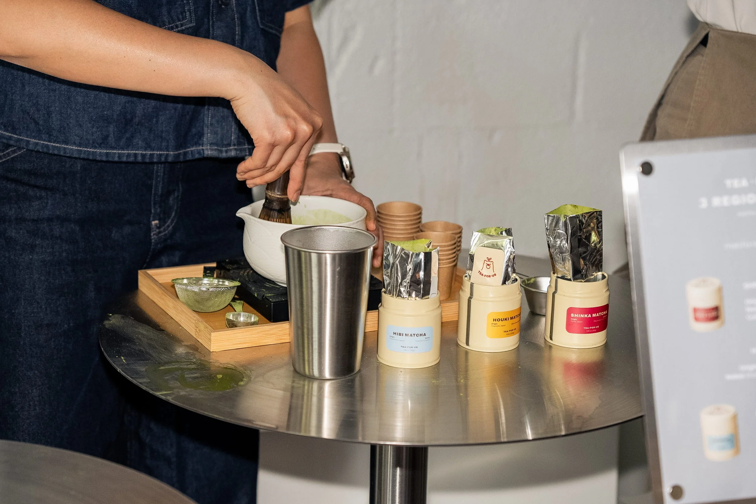 Close up shot of matcha prepartion during a Tea For Us brand activation pop-up with Kindred Studio in San Francisco
