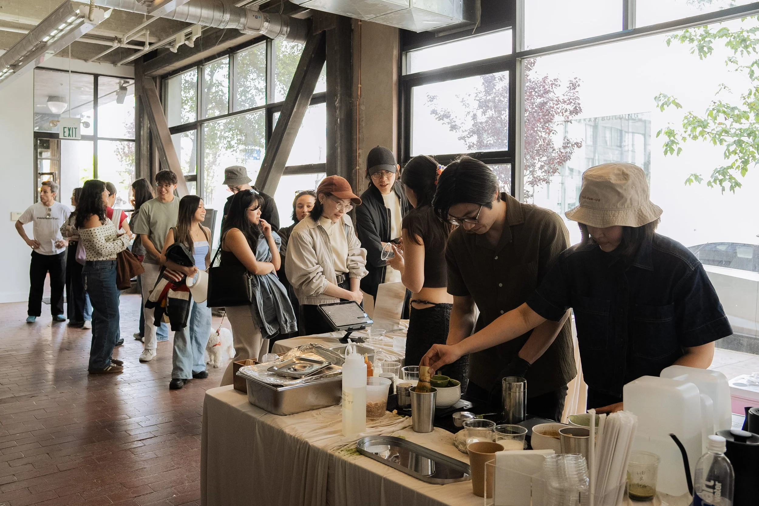 Event photo of customers waiting in line during a Tea For Us brand activation pop-up with Kindred Studio in San Francisco