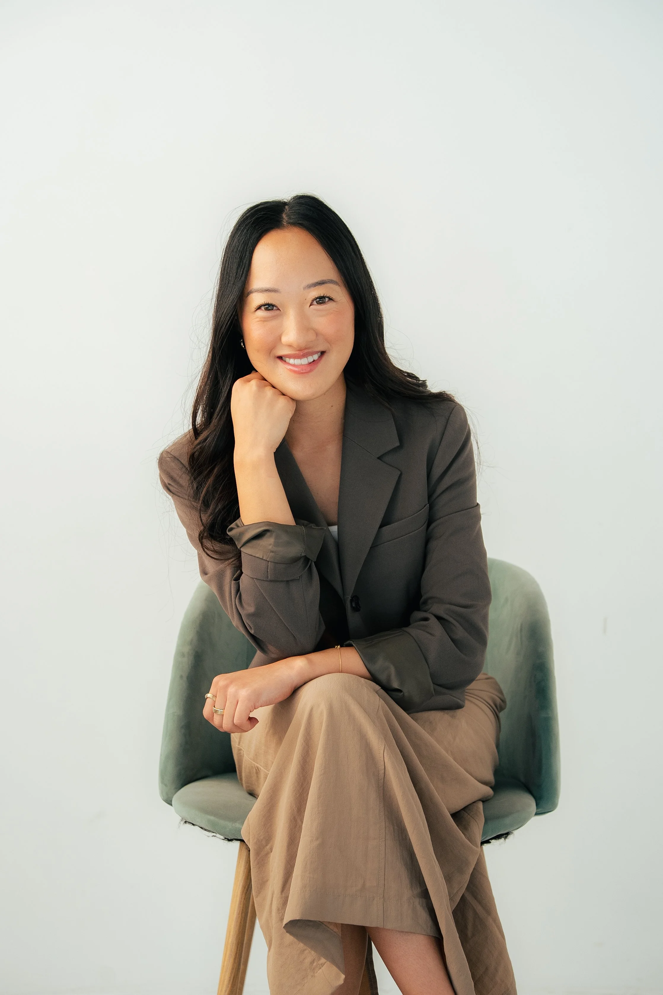 Artistic corporate studio headshot of Asian woman, taken at Creator Studio in San Francisco Bay Area