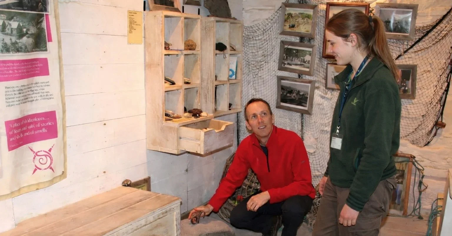 Jon Breton (O'Donoghue) in conversation during a consultancy discussion.