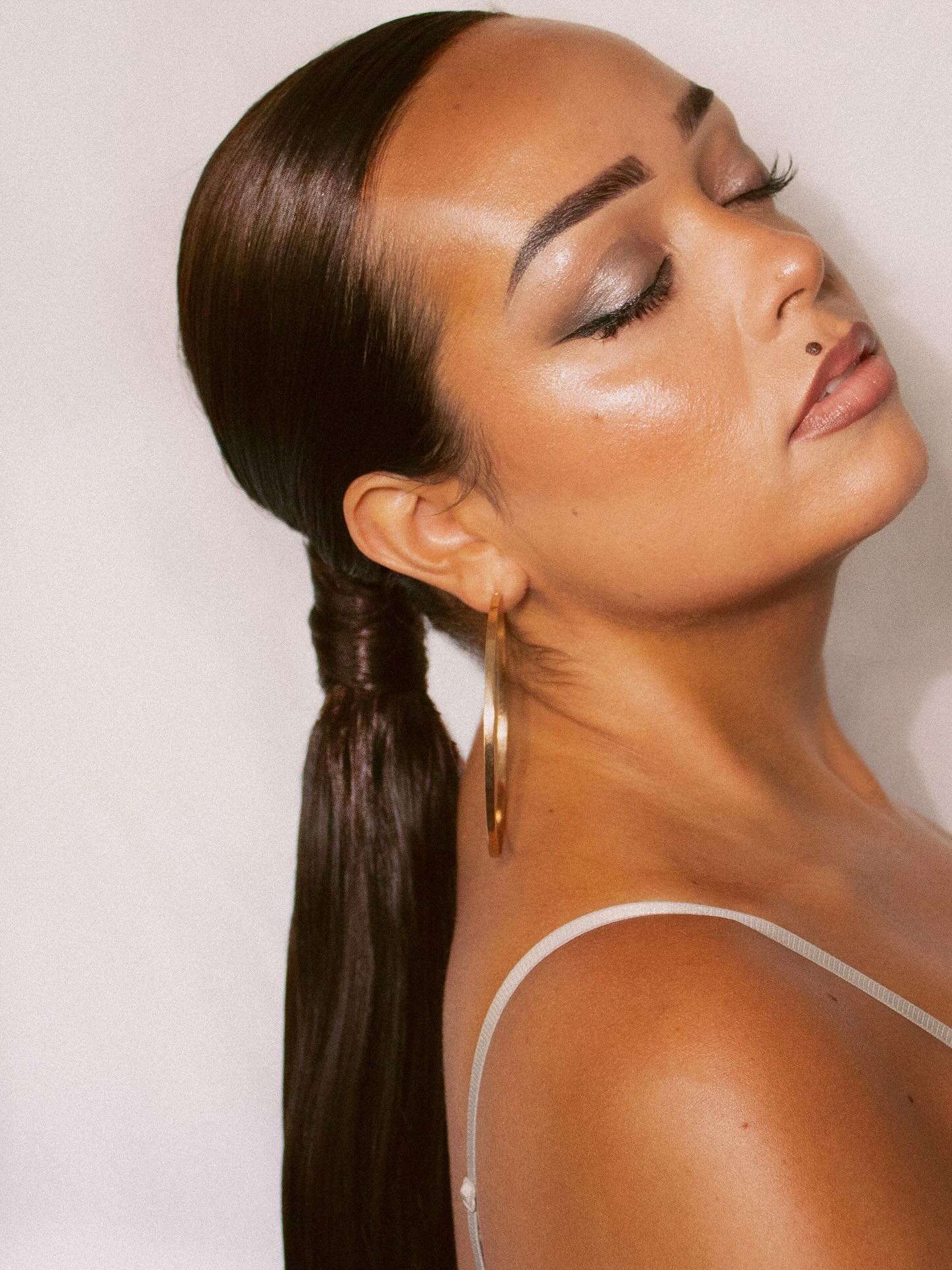 Sleek low pony created by Mollie Barnard for UK editorial hair photoshoot