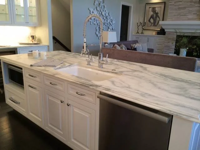 Kitchen island with faucet and dishwasher
