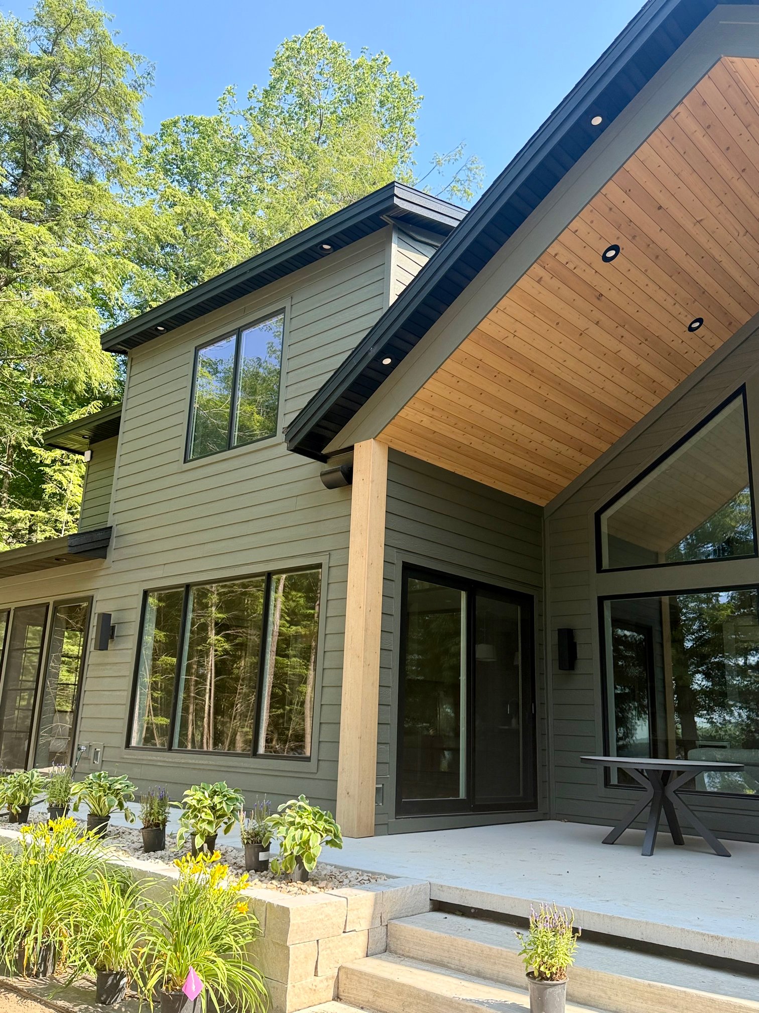 Patio door with cedar beam accent in luxury home