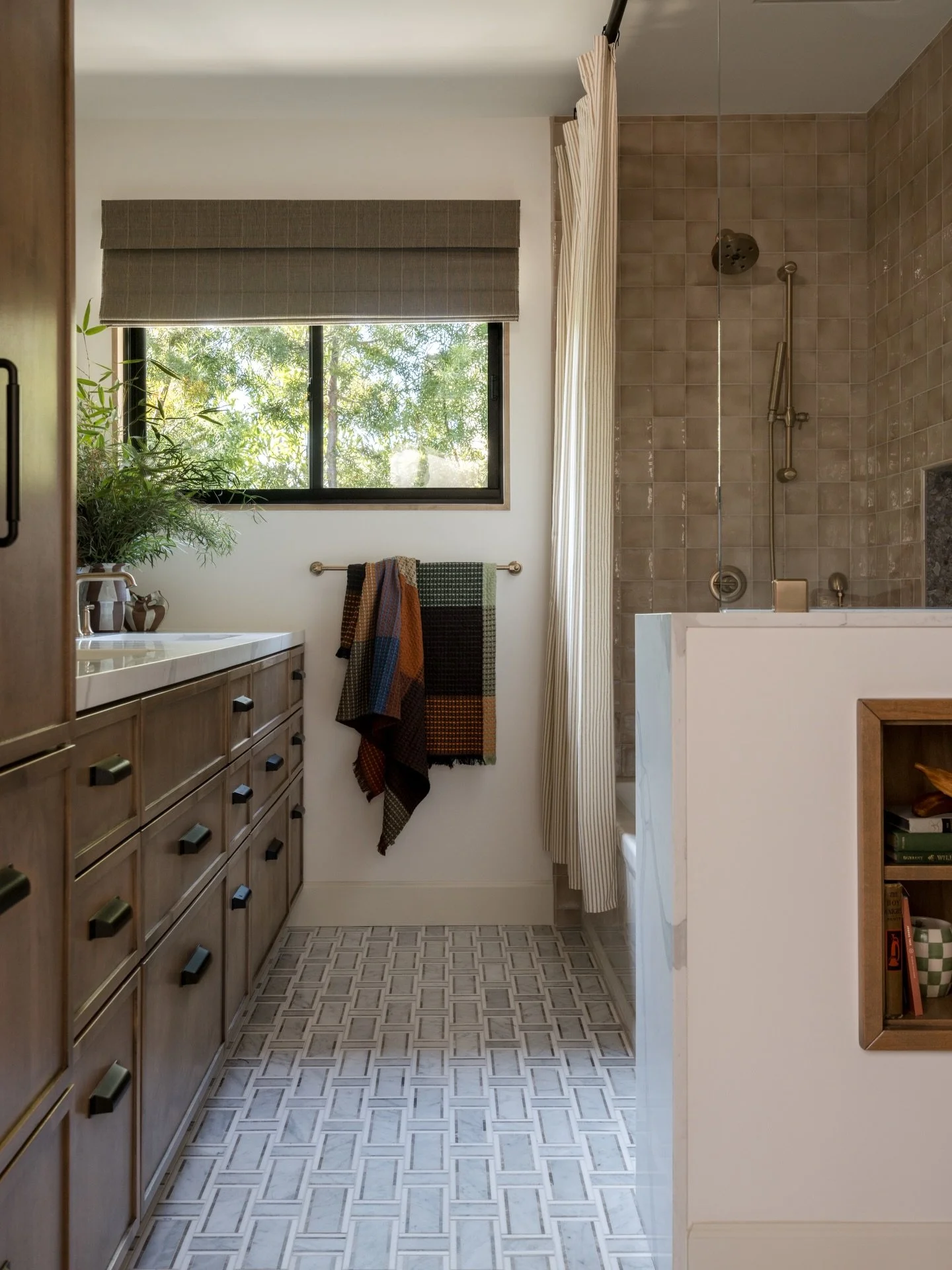 A kids&rsquo; bathroom, but make it smart enough to grow up with them ✨

This space at Project MCMR was designed to feel playful now, while still holding its own long-term. We layered materials for interest and durability: a marble mosaic floor paire