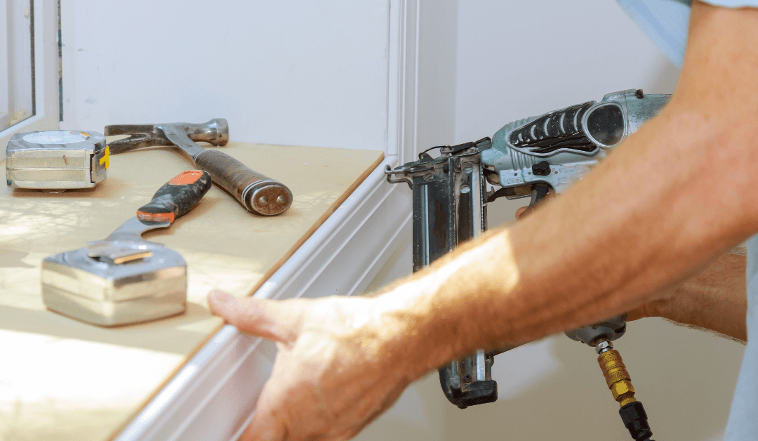 carpenter-close-up-using-on-air-nail-gun-to-moldin-2LJ3DYC-1-1080x628.png