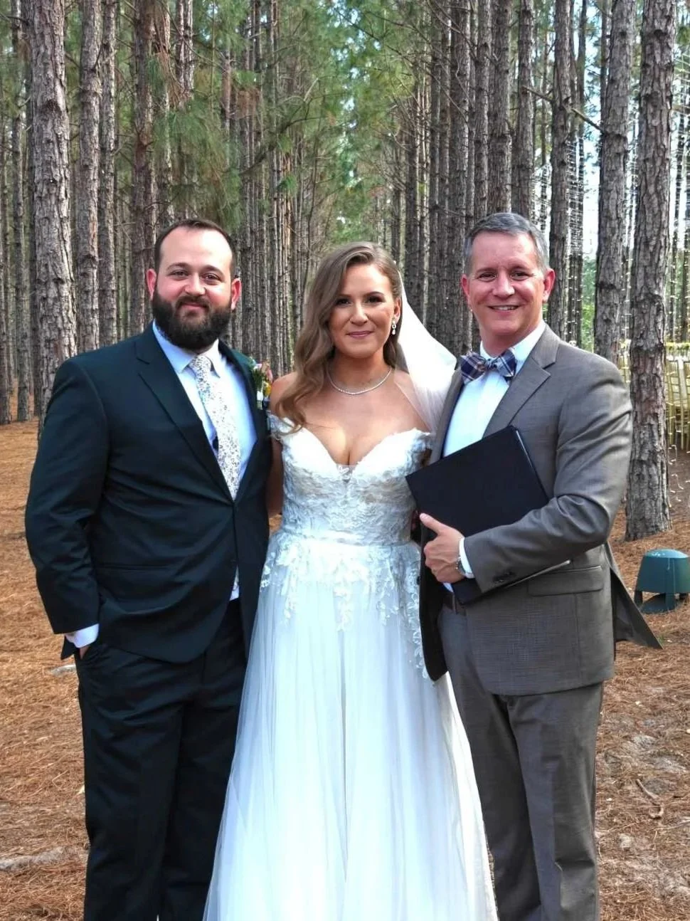 Guy is celebrating with a couple at The Pinery at Howie-in-the-Hills, Florida