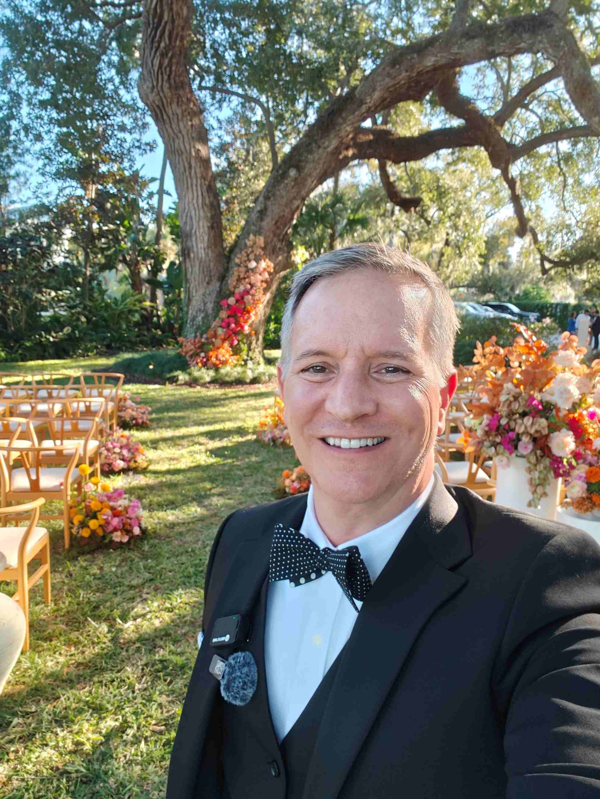 Guy is all mic'd up and ready to officiate a wedding in New Smyrna, Florida