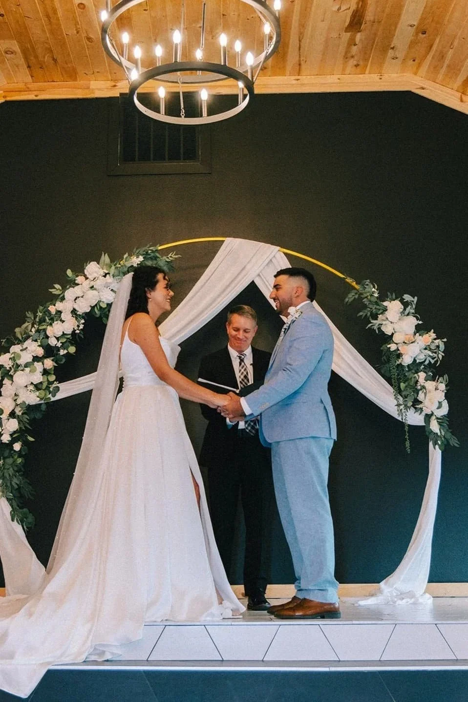 Guy marries a couple at the black barn in Orlando, Florida