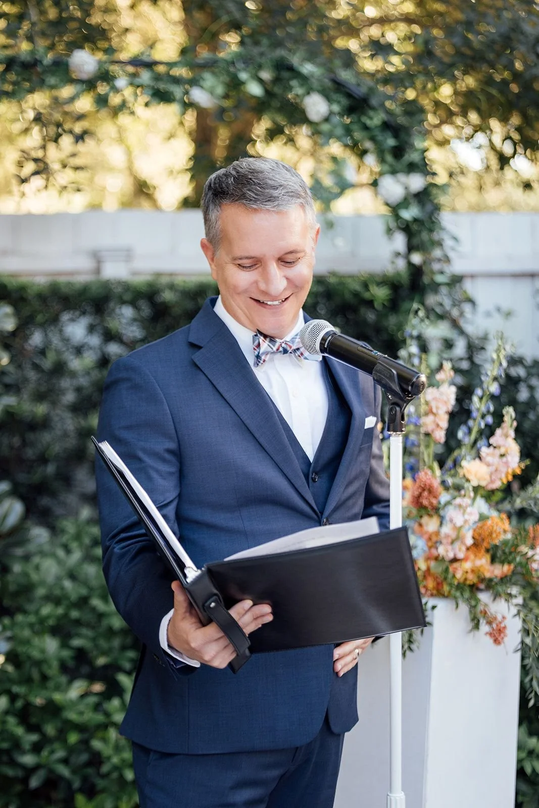 Guy is smiling during a beautiful ceremony at Historic Venue 1902 in Sanford, Florida