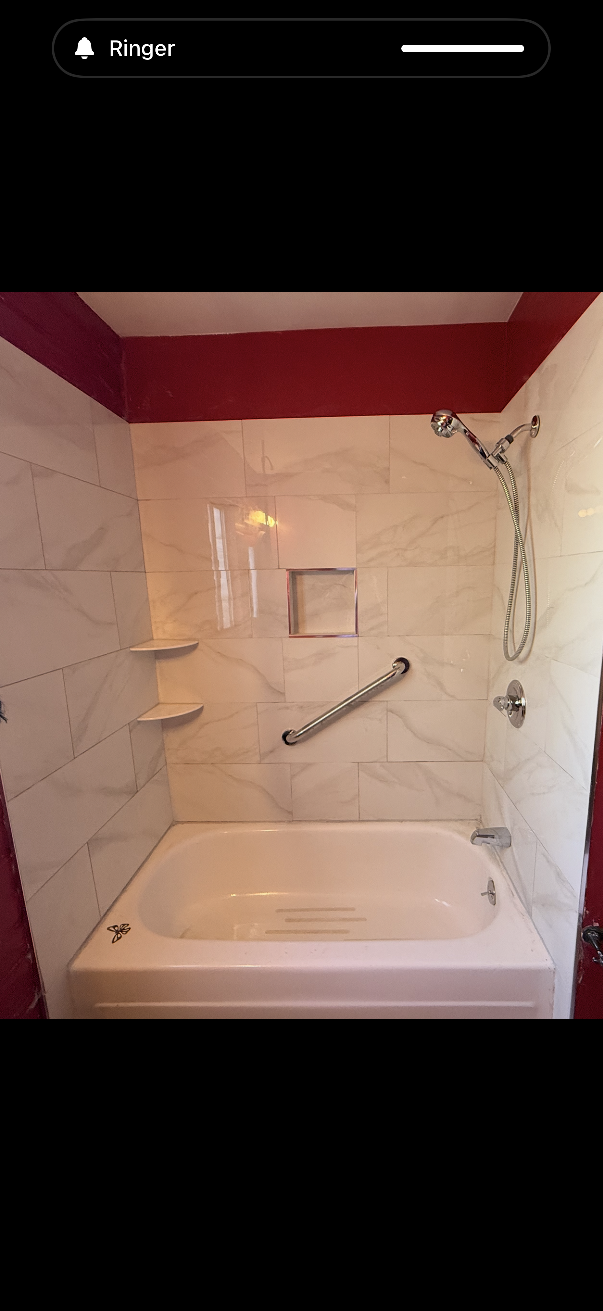 12"x24" Ceramic Tiles, very affordable at $500 per tile makes an upgrade doable. The customer also wanted to replace the 2 knobs to a single.I did all the plumbing.  myself.
