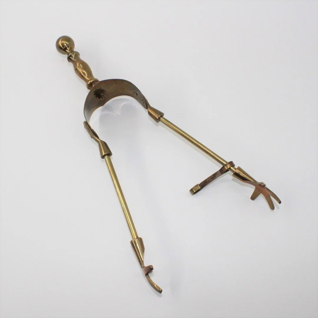 Vintage brass fireplace companion set including four tools