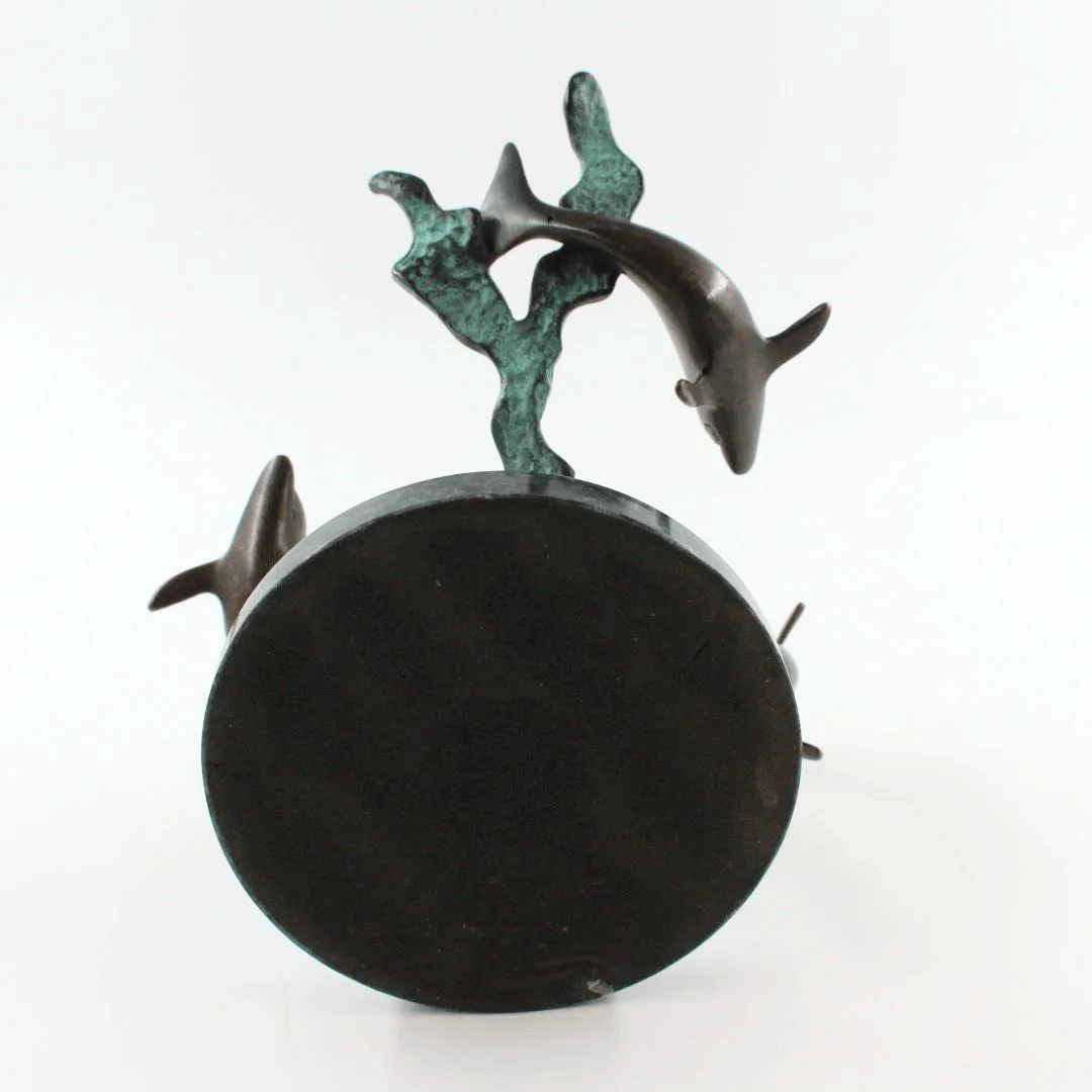 Bronze patinated dolphin sculpture