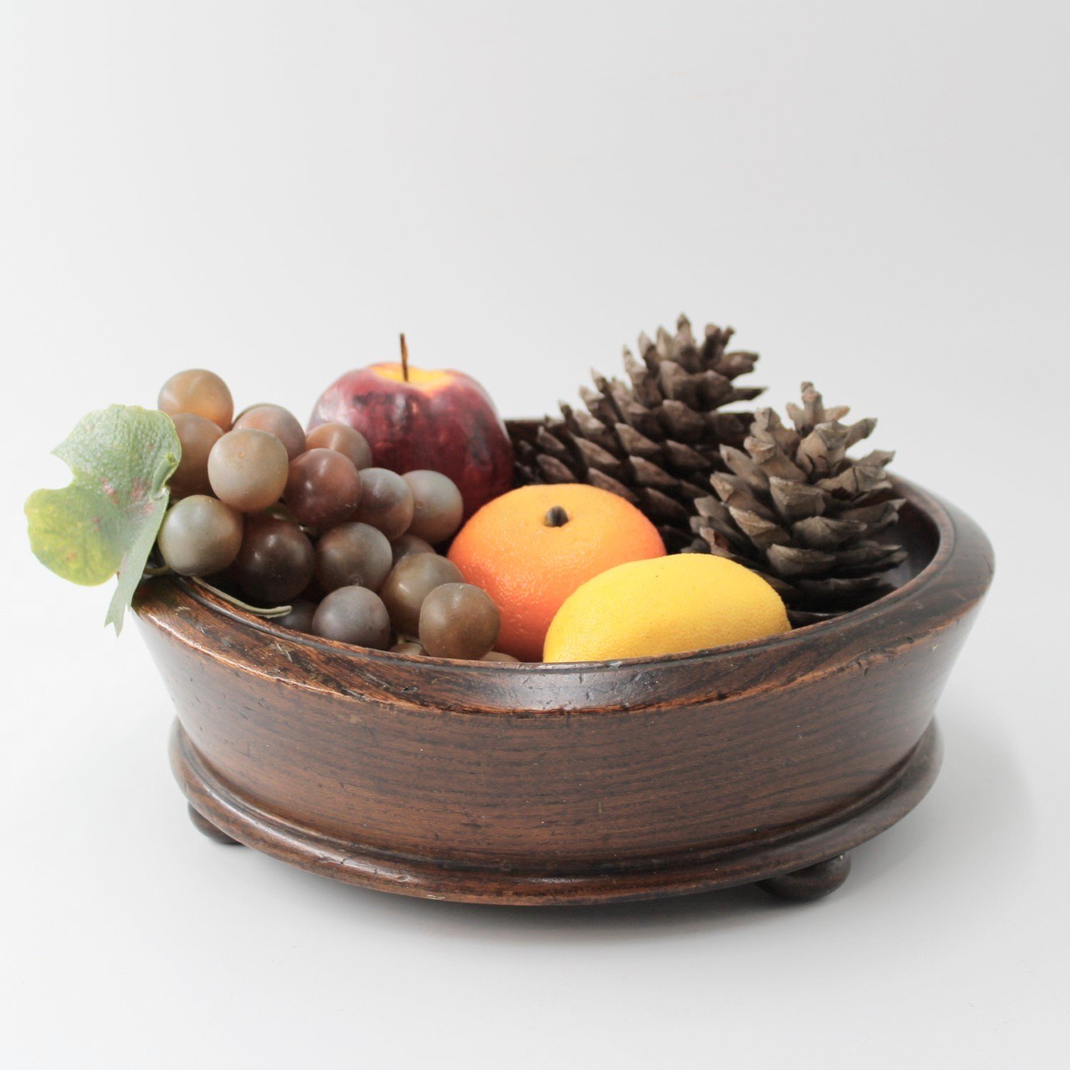 Mid Century turned oak fruit bowl bun feet