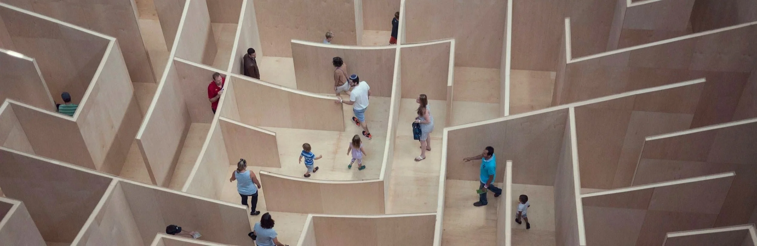 People lost in a maze.