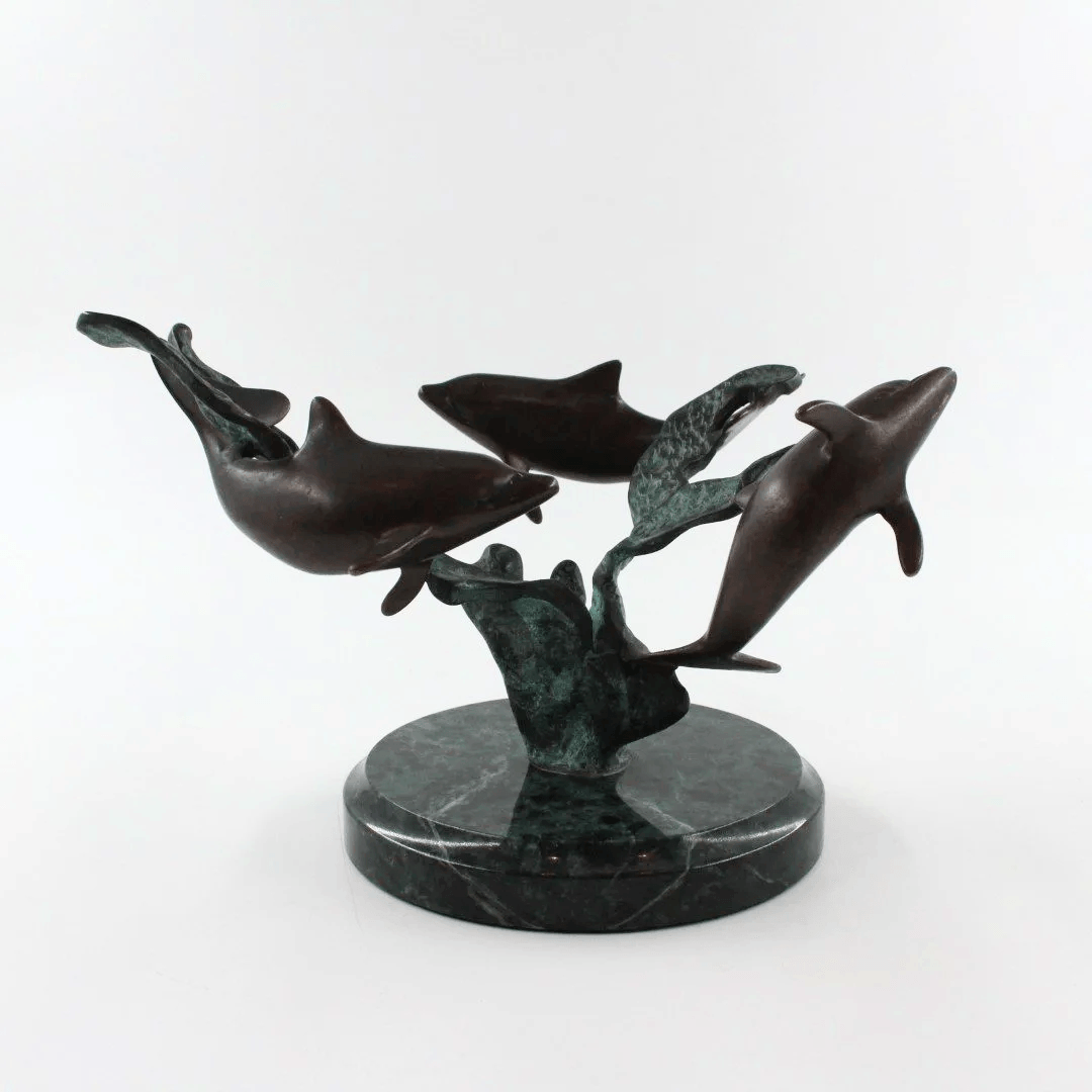Bronze patinated dolphin sculpture