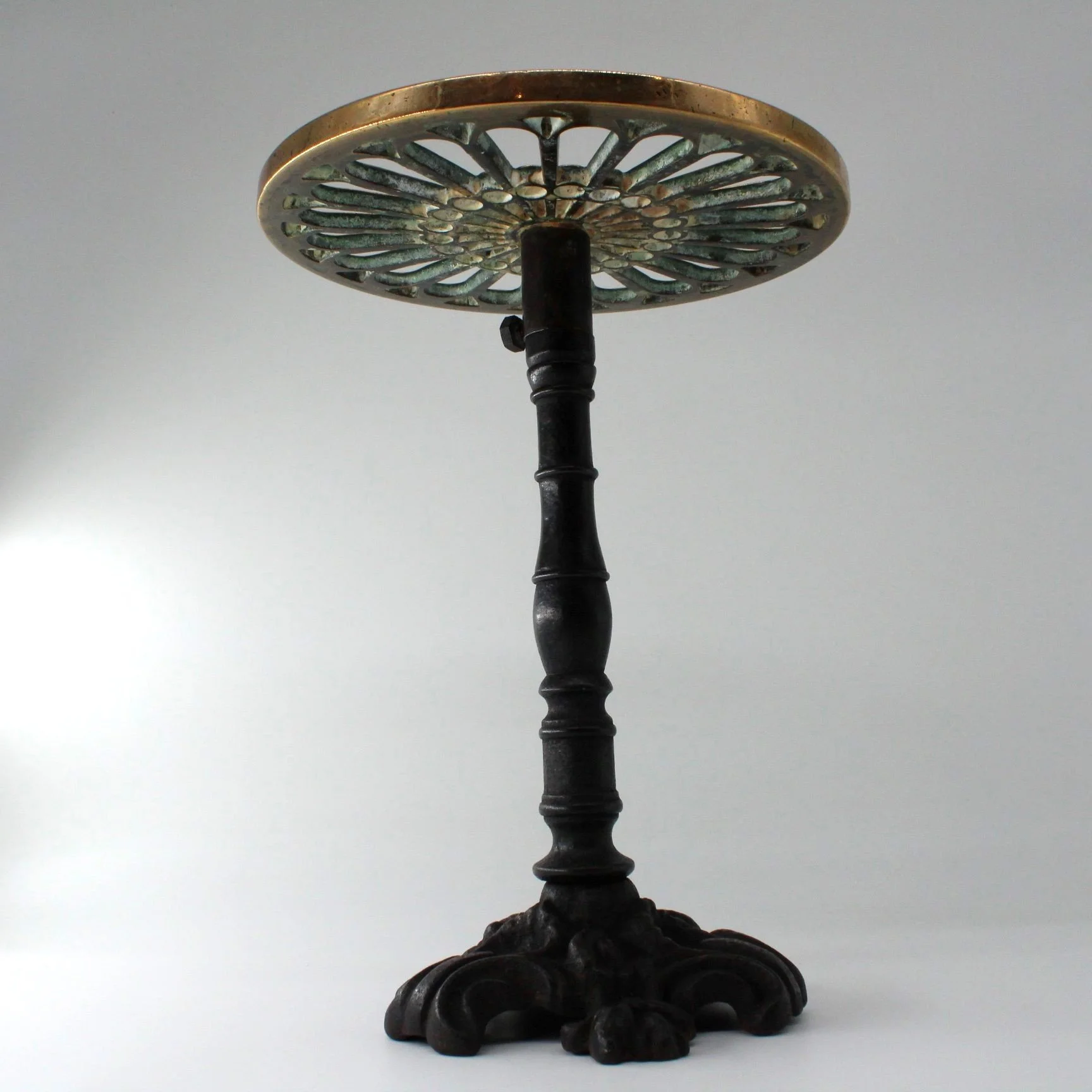 Antique cast iron and brass plant pot stand trivet