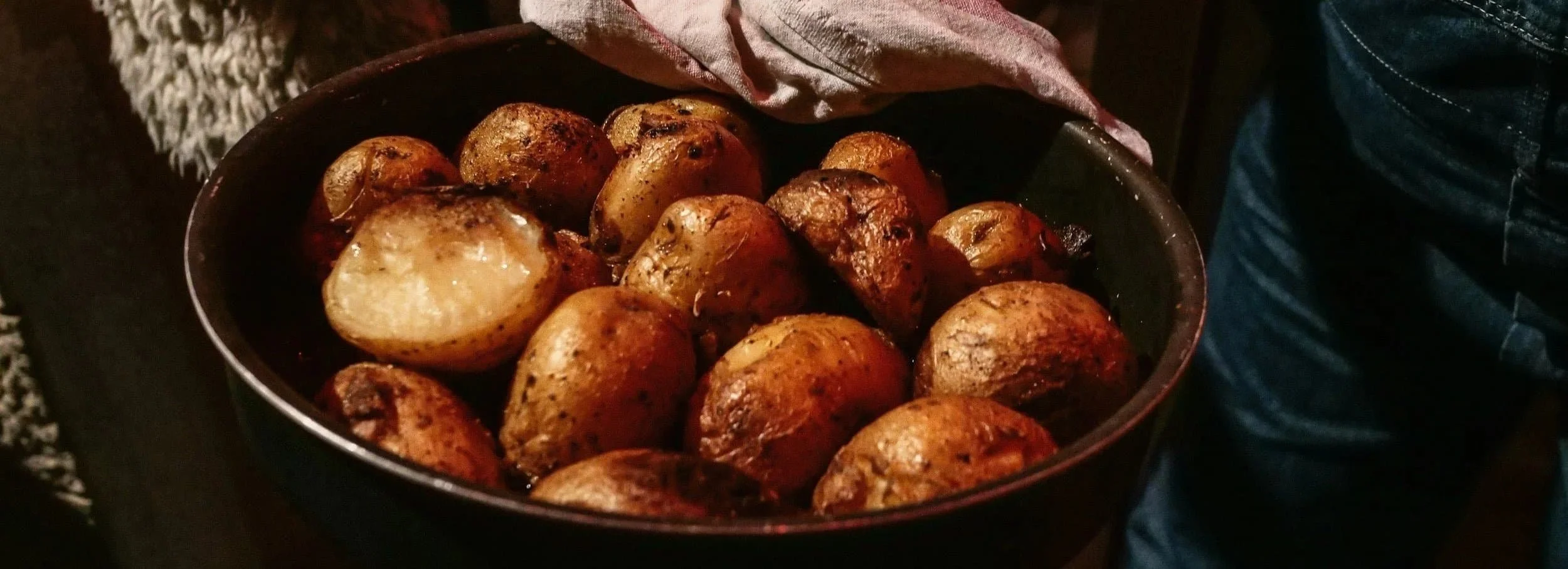 Roast potatoes in a bowl.