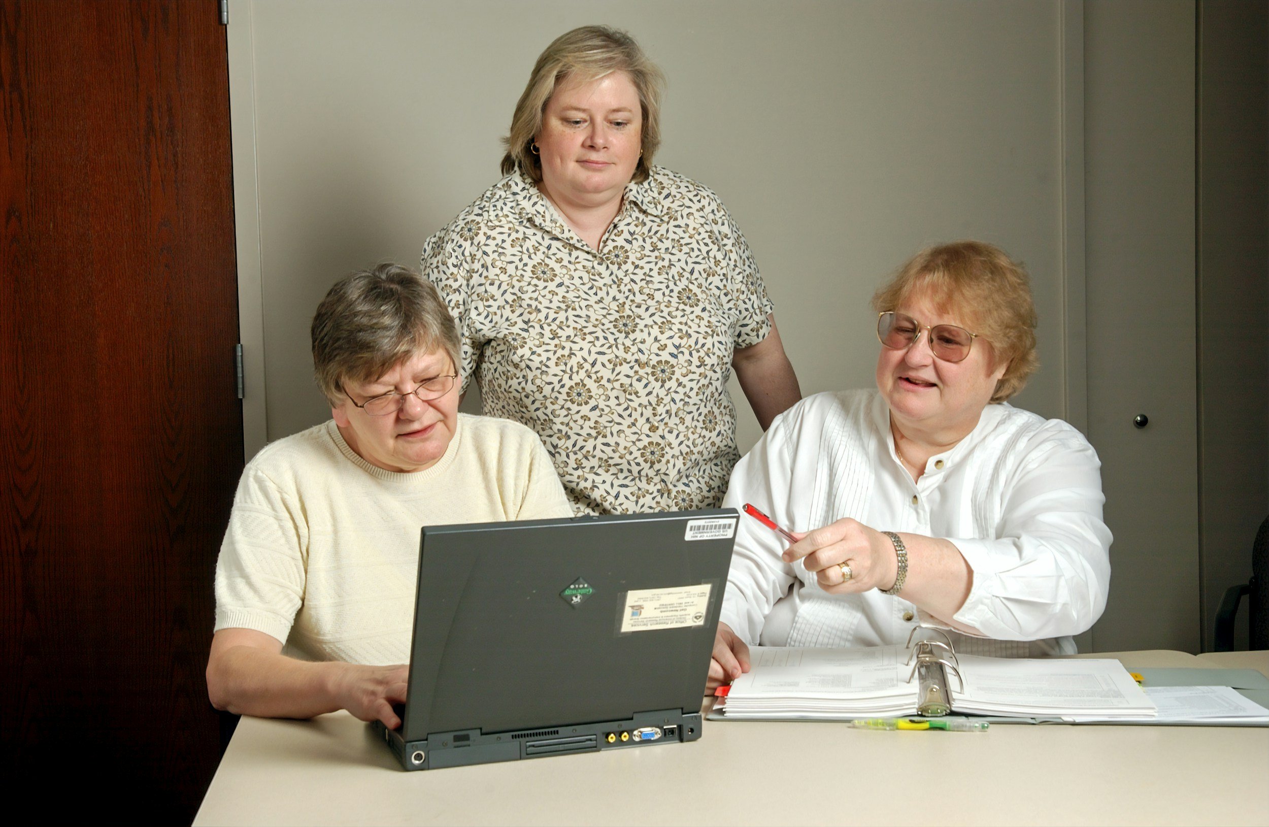 older people and a computer