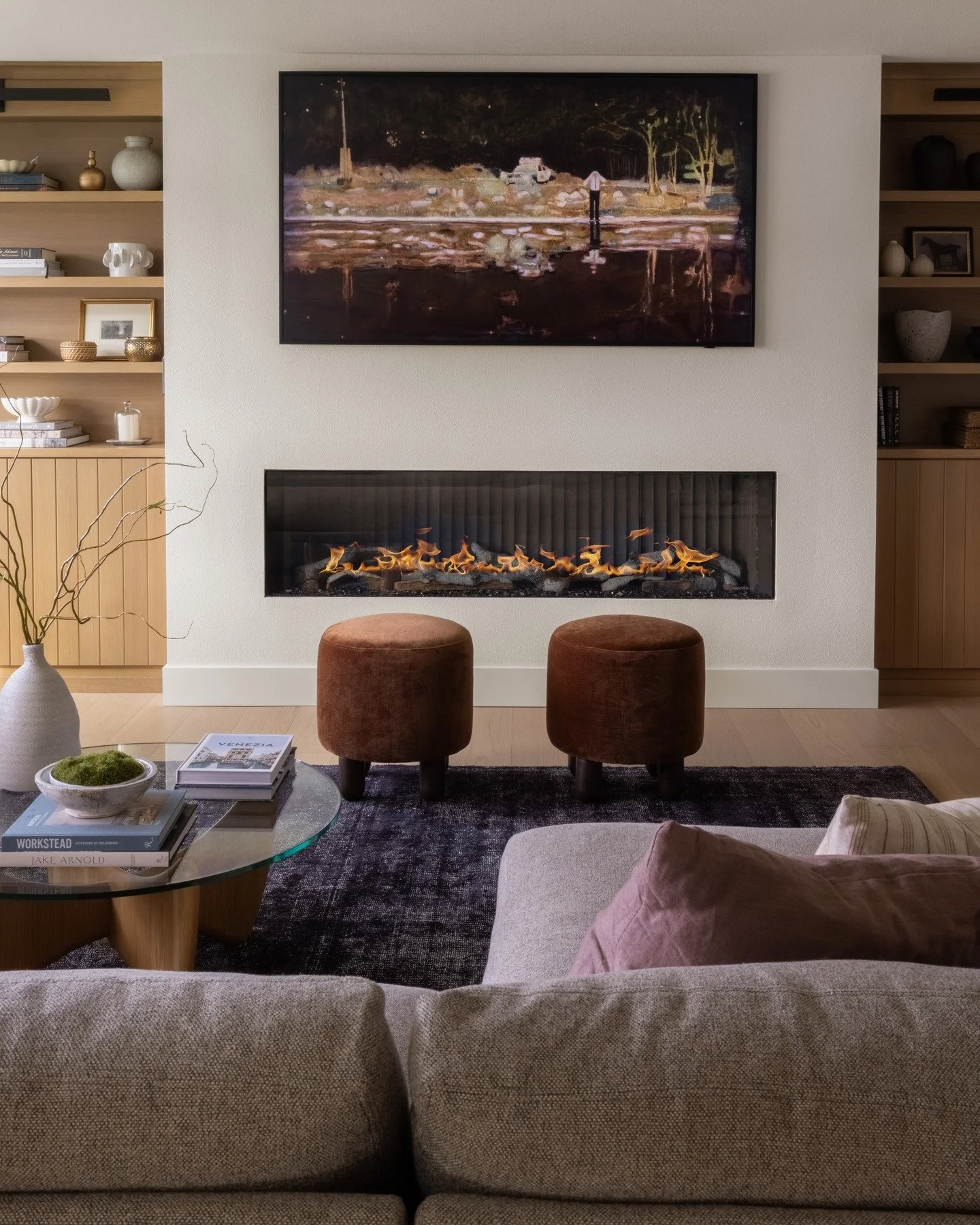 The living room at our Lake Tapps project is the perfect place to curl up by the fire on the rainy days in the PNW.  
  Design &amp; Styling: @jillianinteriors 
Photo: @_karamercer