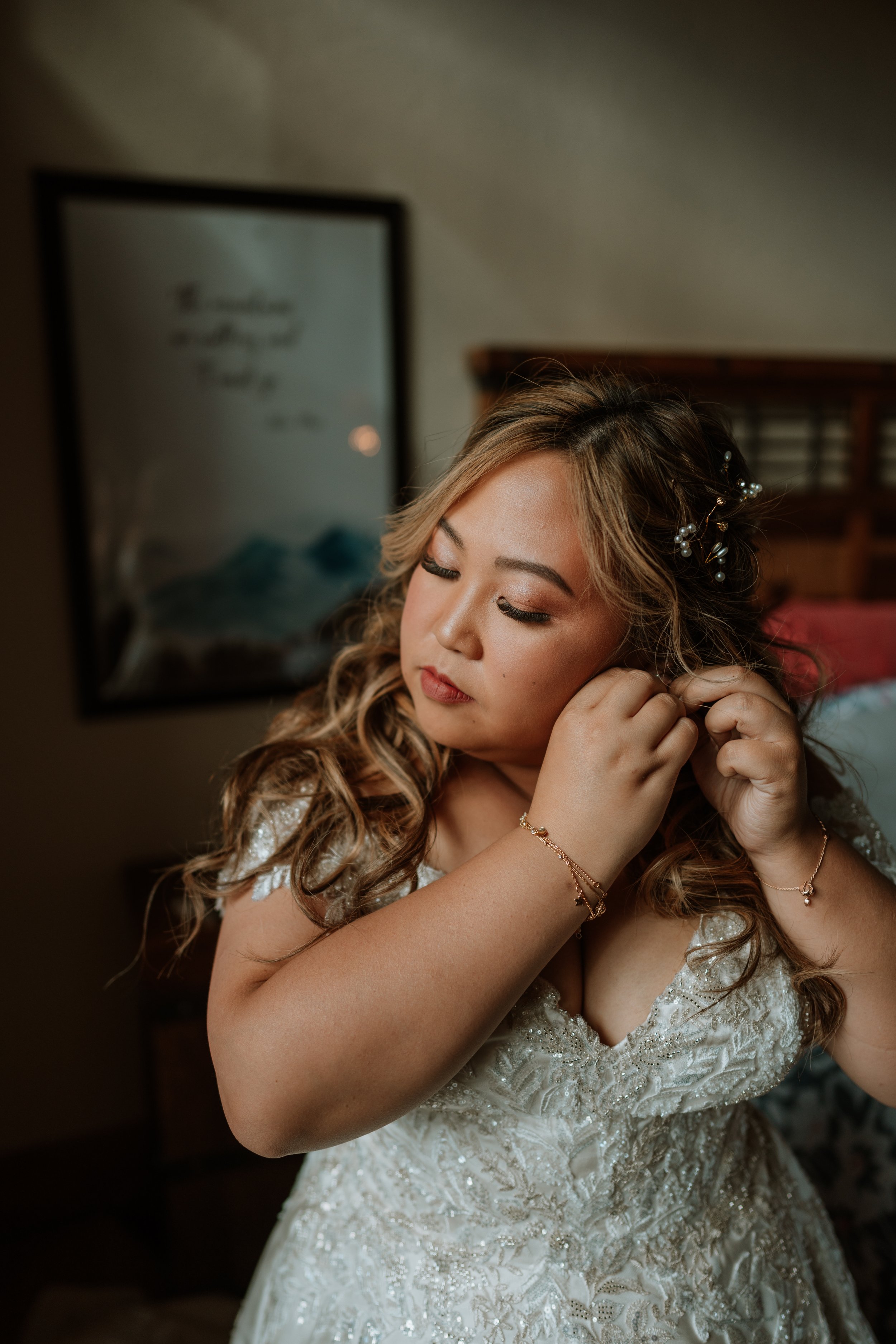  Clip in extensions were installed and a super curly half up with lots of braids. Makeup was centered around shimmer and contours.  Paige Weber Photography 