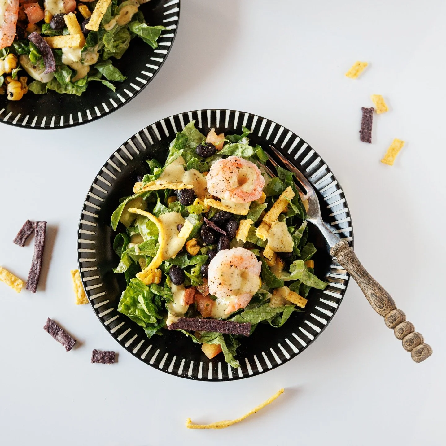This is currently my favorite summer salad from Trader Joe's. I split the salad up in two portions so that it looks better in the frame.
My only complaint with the salad is that there is not enough dressing. I usually don't like too much dressing, bu