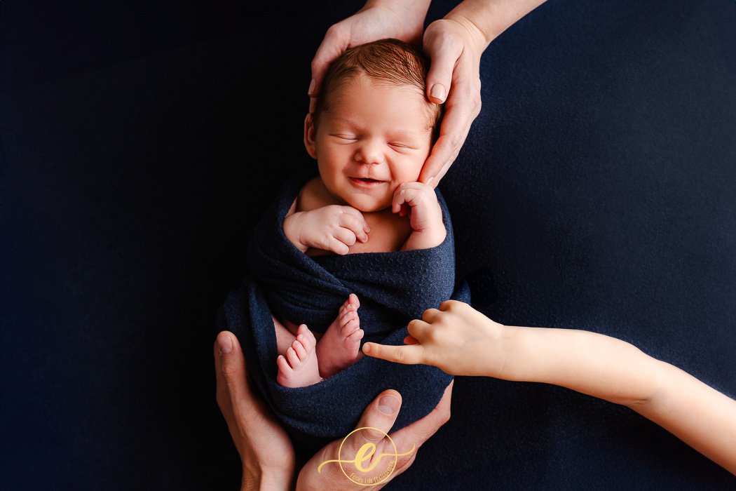 Why should you contact your newborn photographer as soon as you know the gender?
